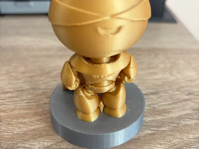 Golden Creality mascot