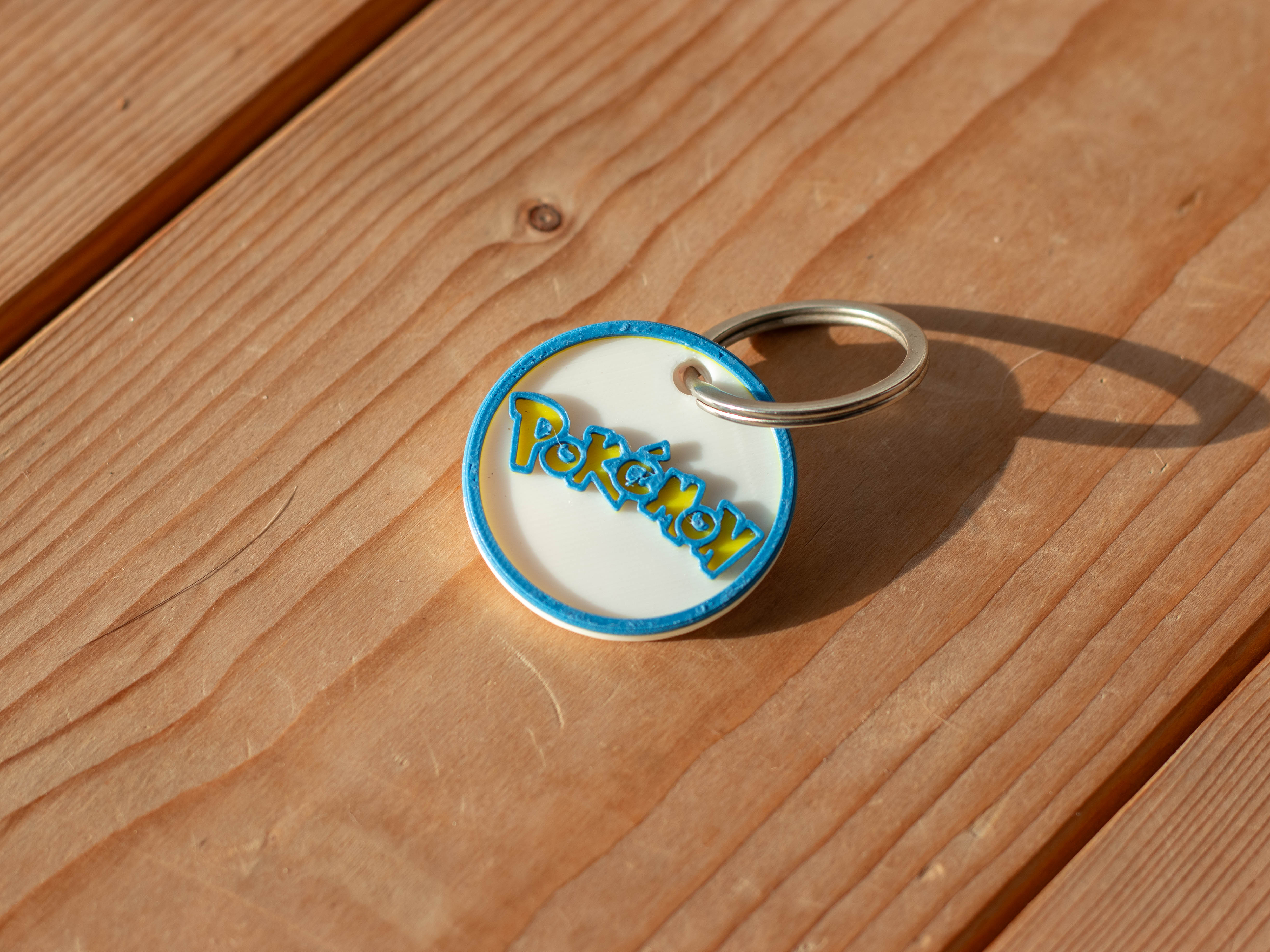 Miniatura 2 do modelo 3D Pokemon Logo Keychain