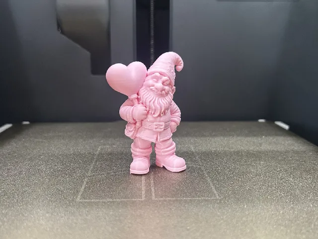Gnome Holding Heart Sign