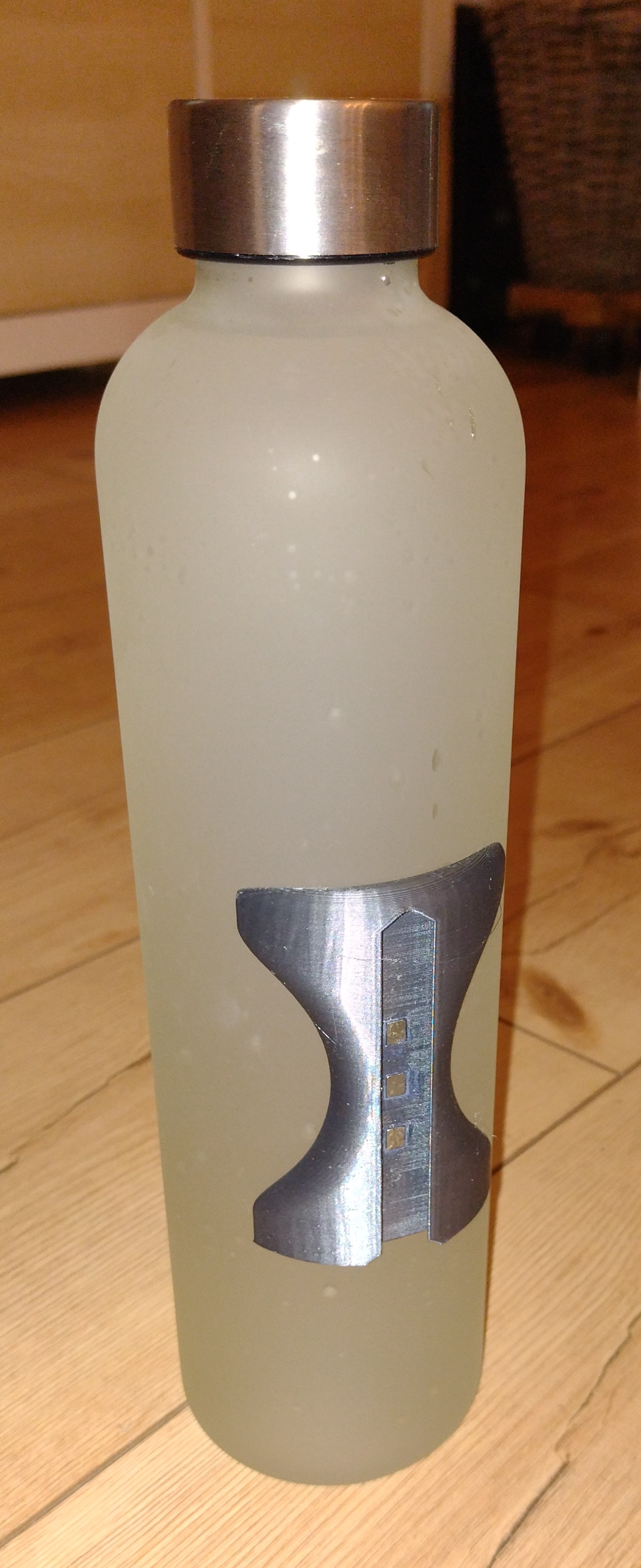 Bicycle bottle holder, magnet snap fit
