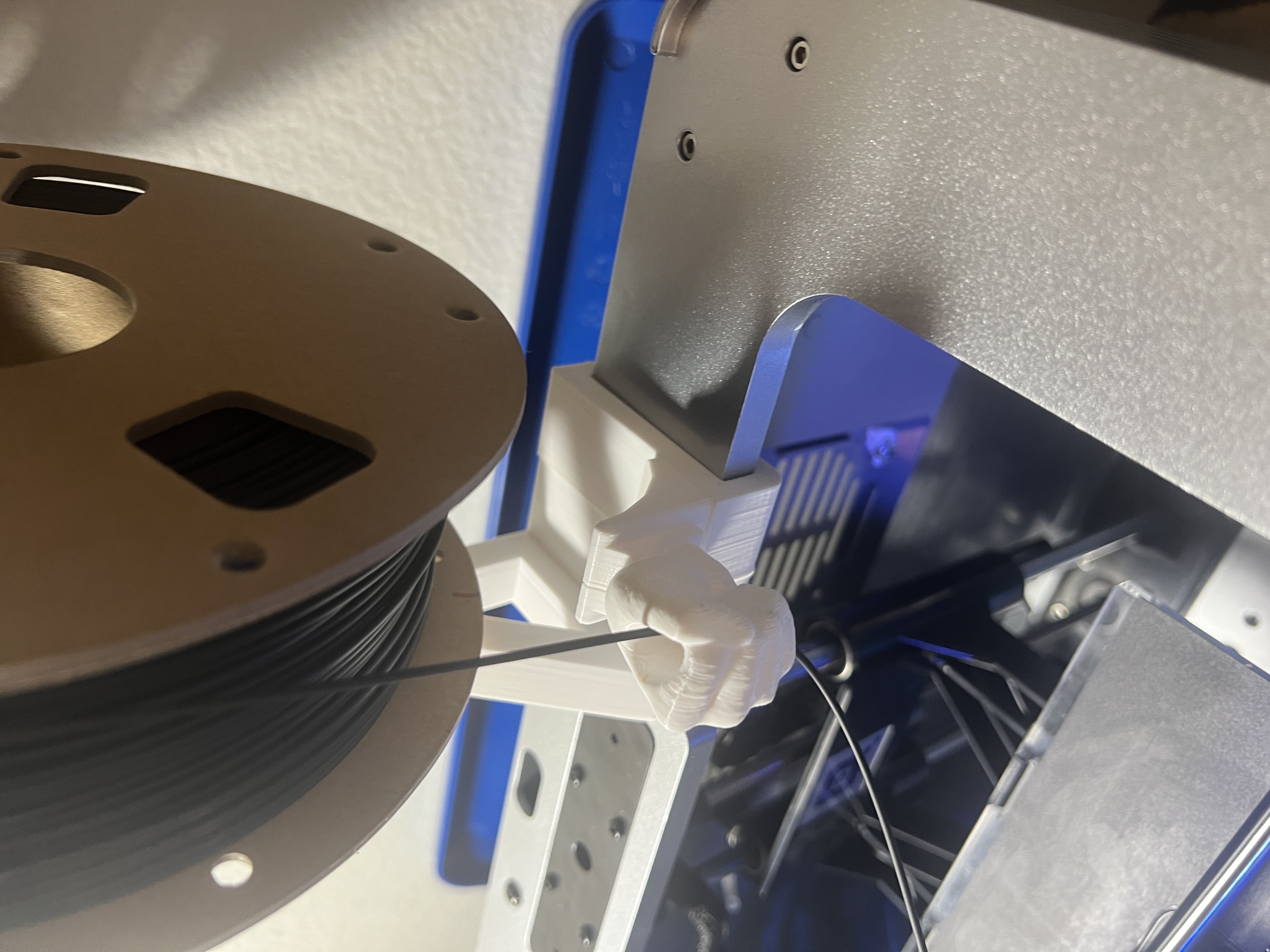 Filament guide Smashing Fist for Dremel 3d20 idea builder