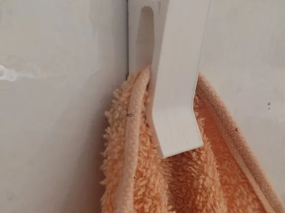 Towel wall clip