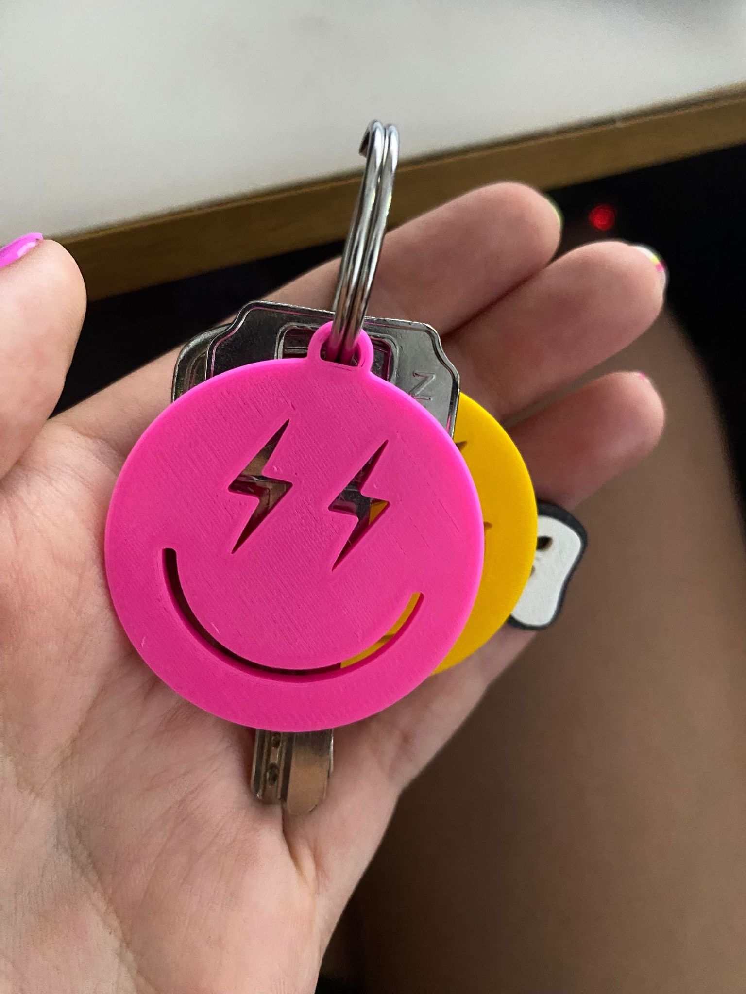 Smile face keychain by Beatriz Rosa Download free STL model