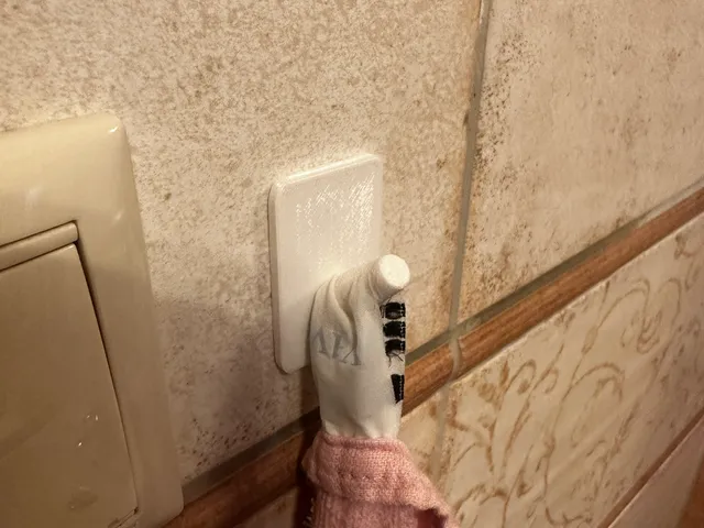 Towel hanger with sticker