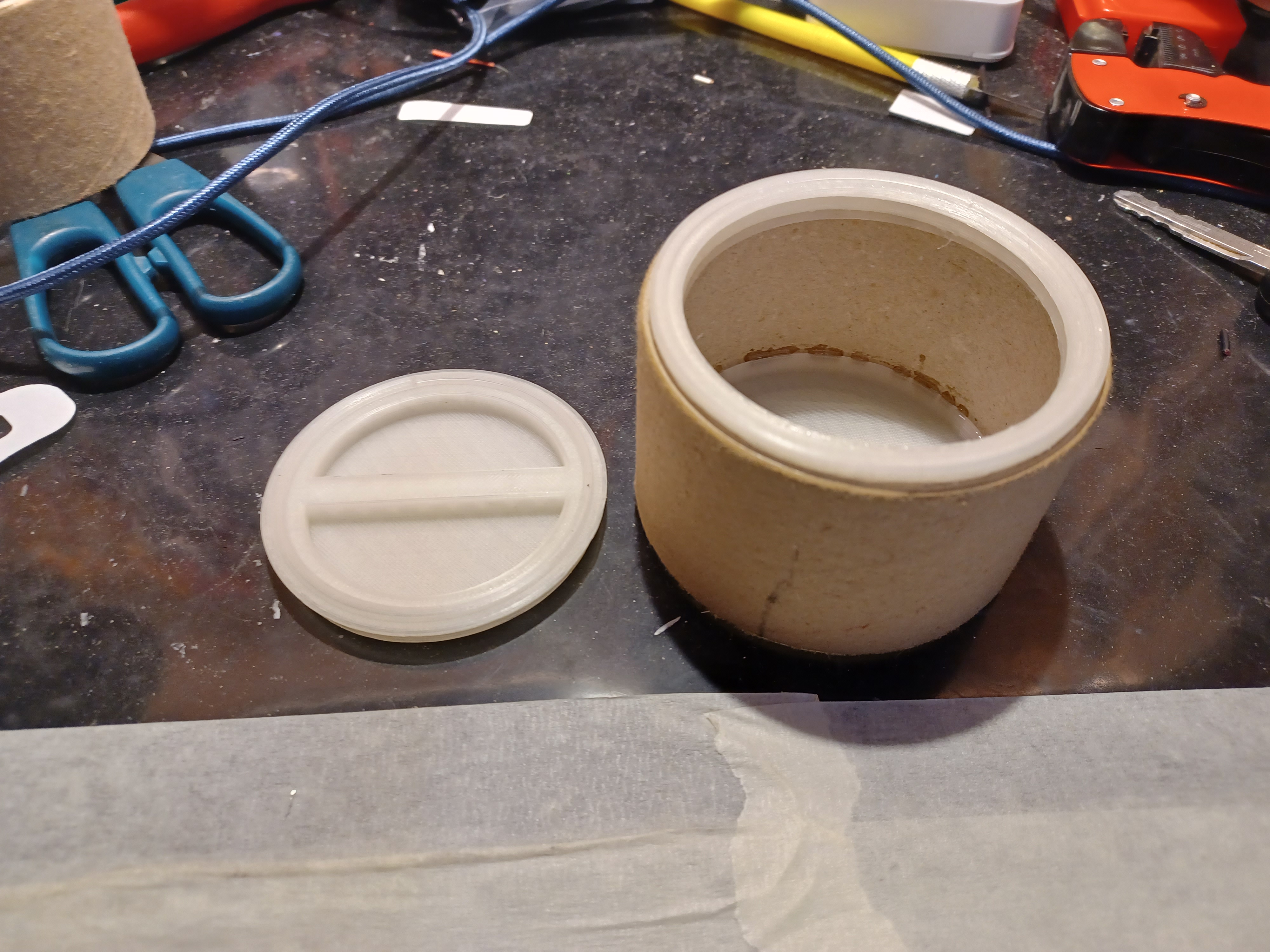 Threaded box made from adhesive tape end roll.