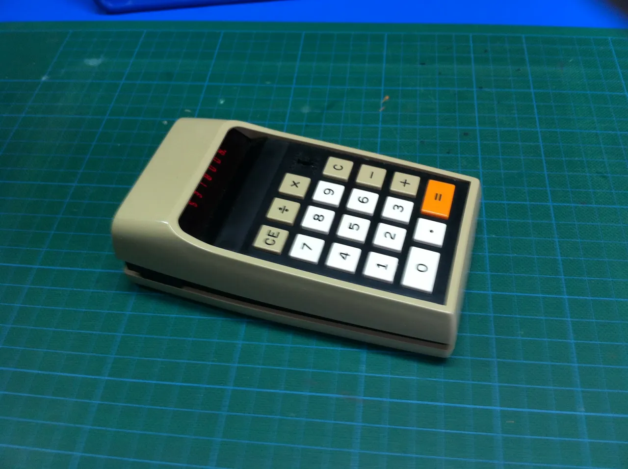 Texas Instruments Datamath 2500 calculator nameplate by Brad Grier