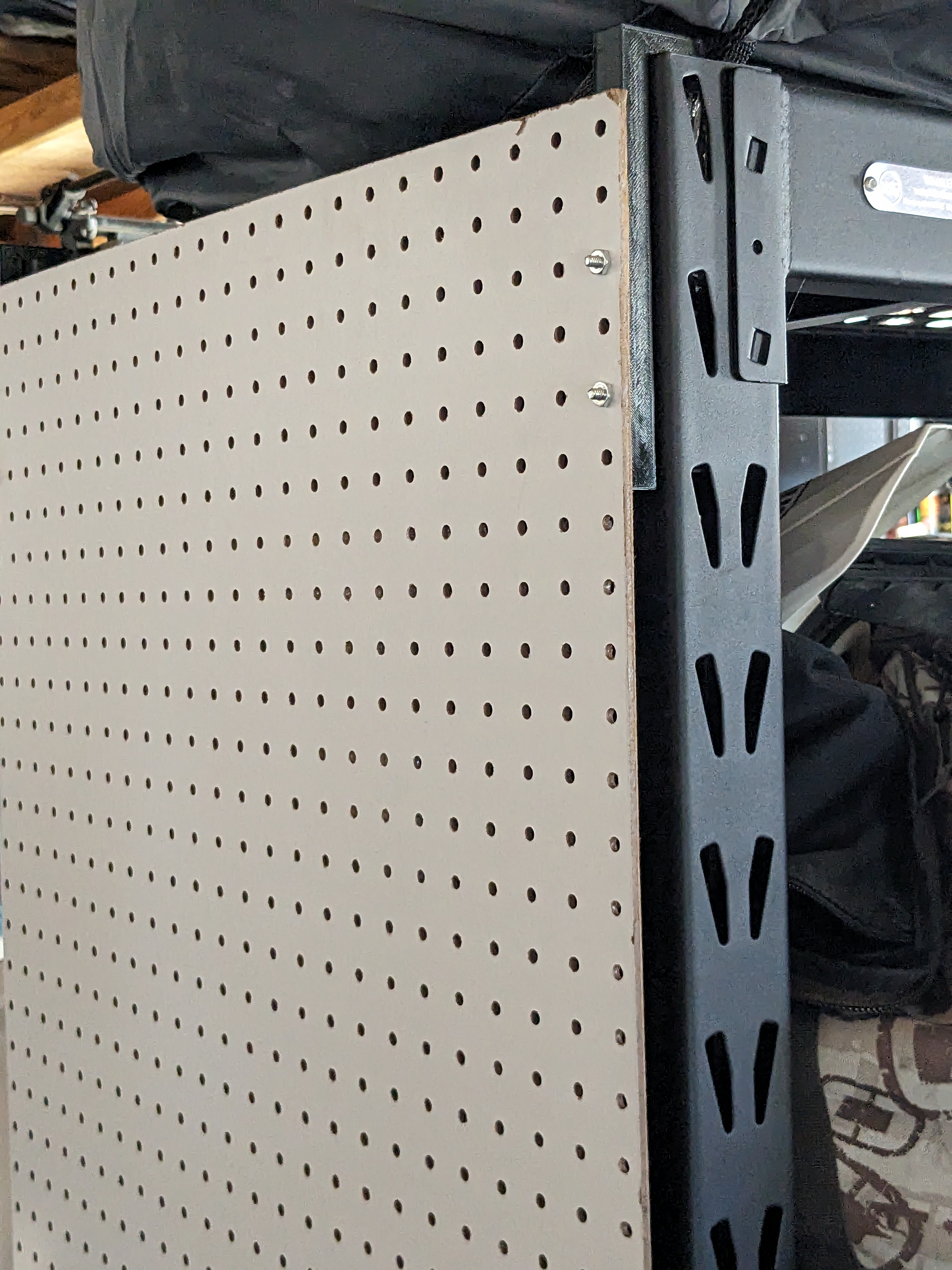Pegboard shelf bracket and spacer