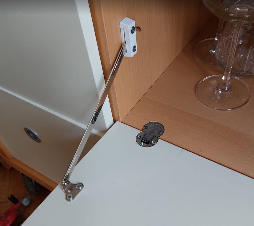Habitat drop down drawer shelf strap guide