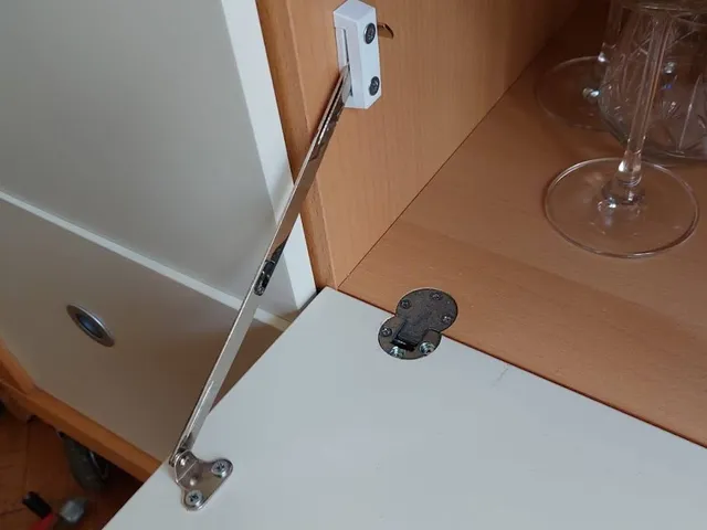 Habitat drop down drawer shelf strap guide