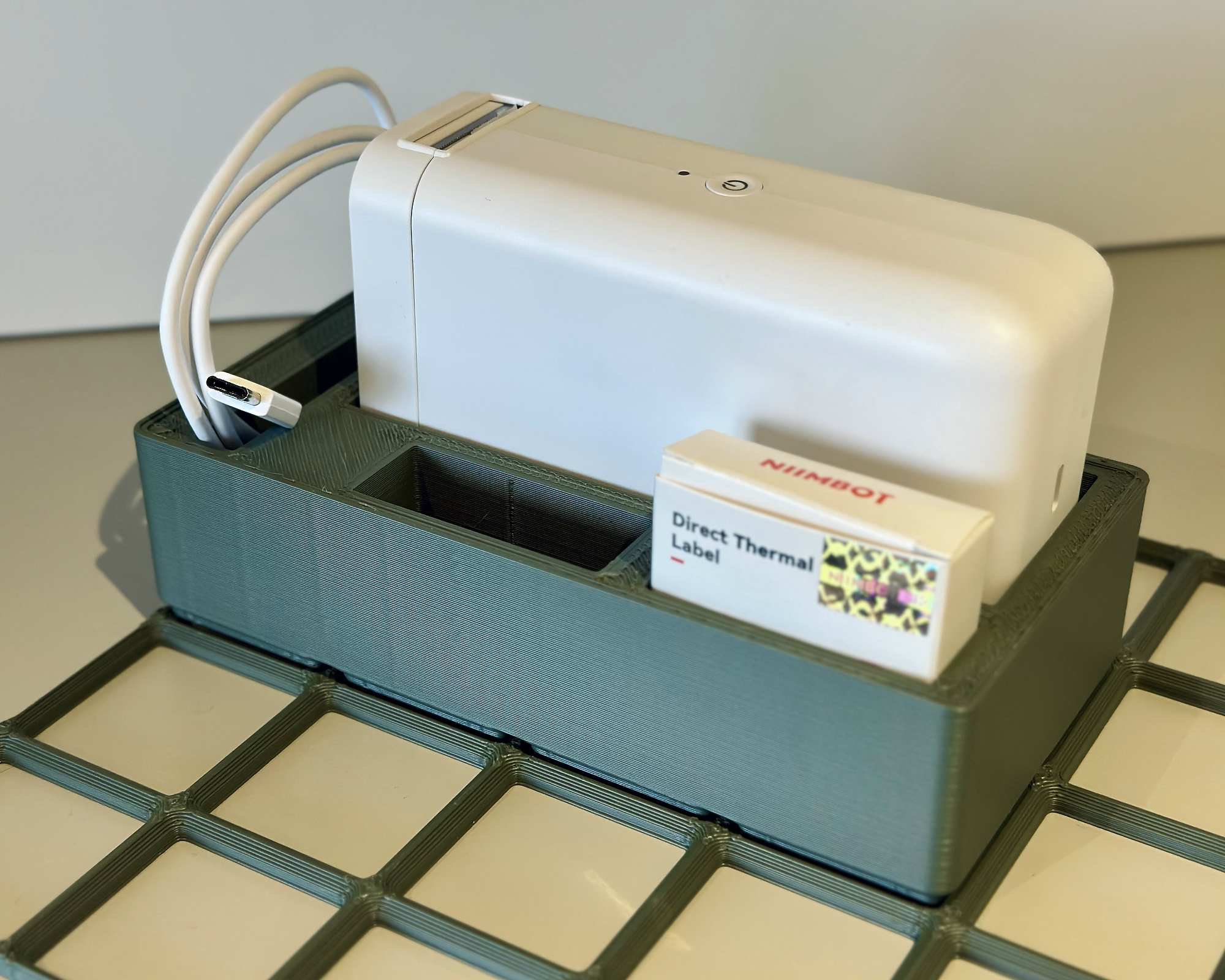 Gridfinity Holder for Niimbot D101 Label printer 3D model thumbnail