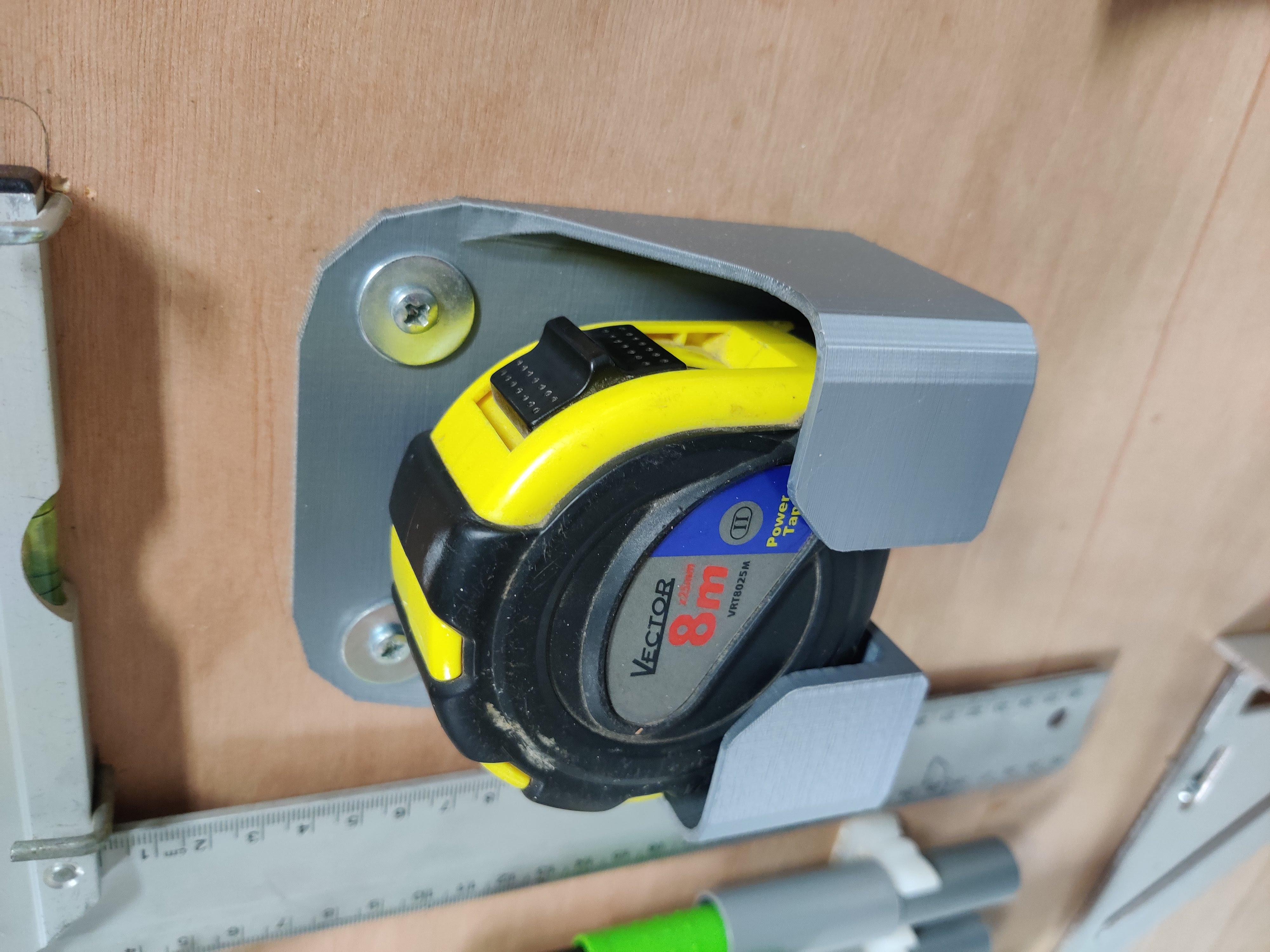 Measuring tape holder
