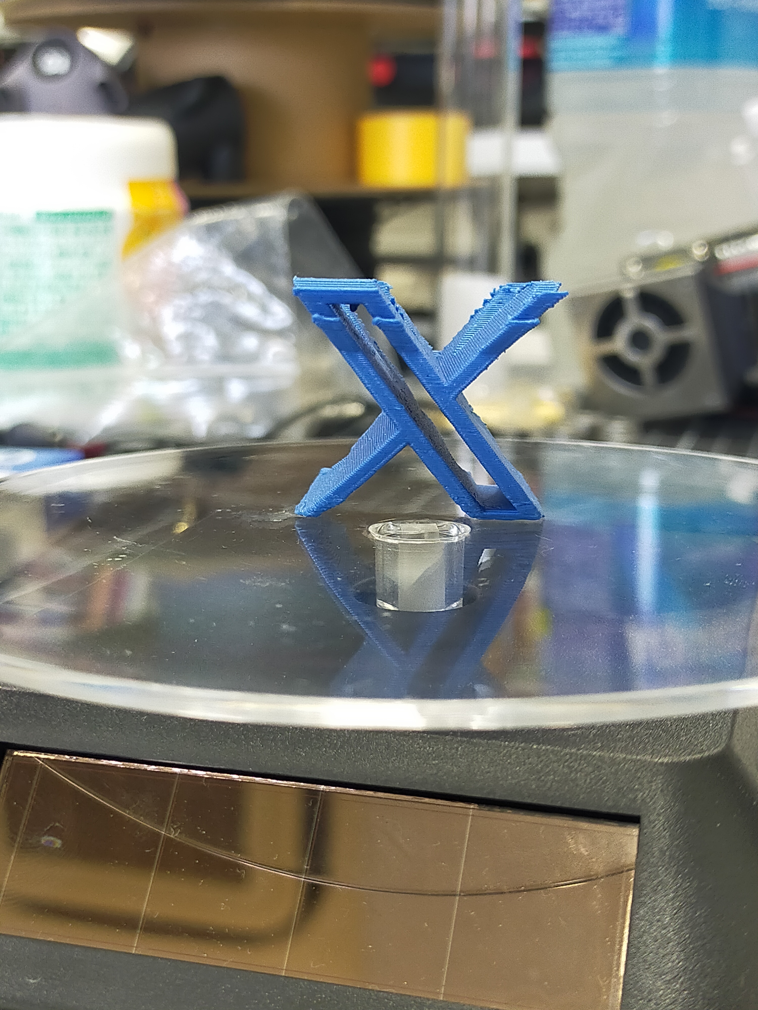 The Twitter logo changed from a blue bird to an "X."