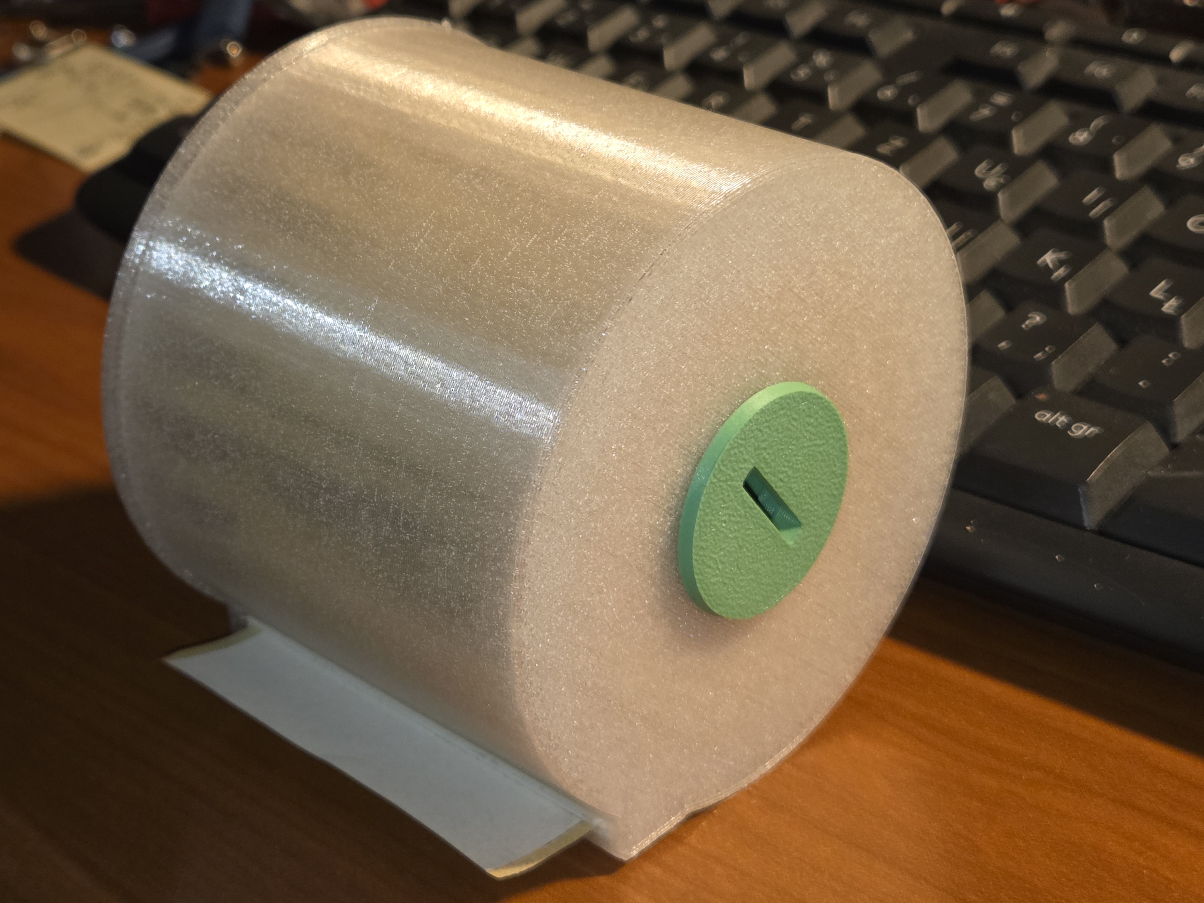 Bolt and nut to hold together the label dispenser