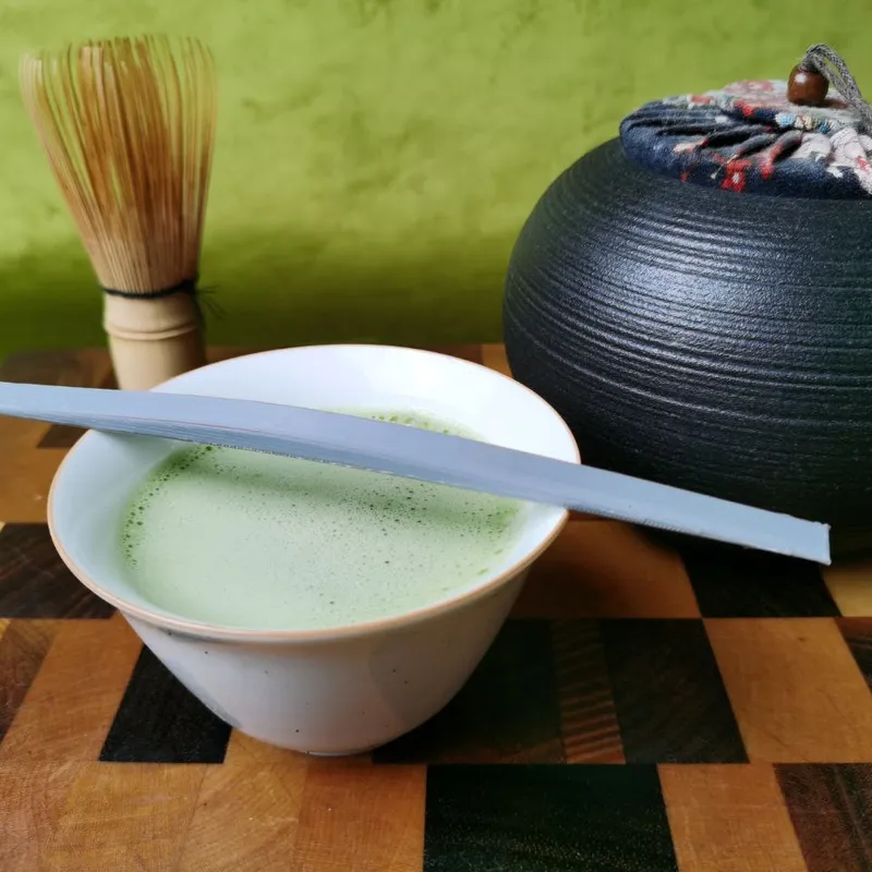 Lexica - A good looking cup of matcha tea in a tea hut in vintage