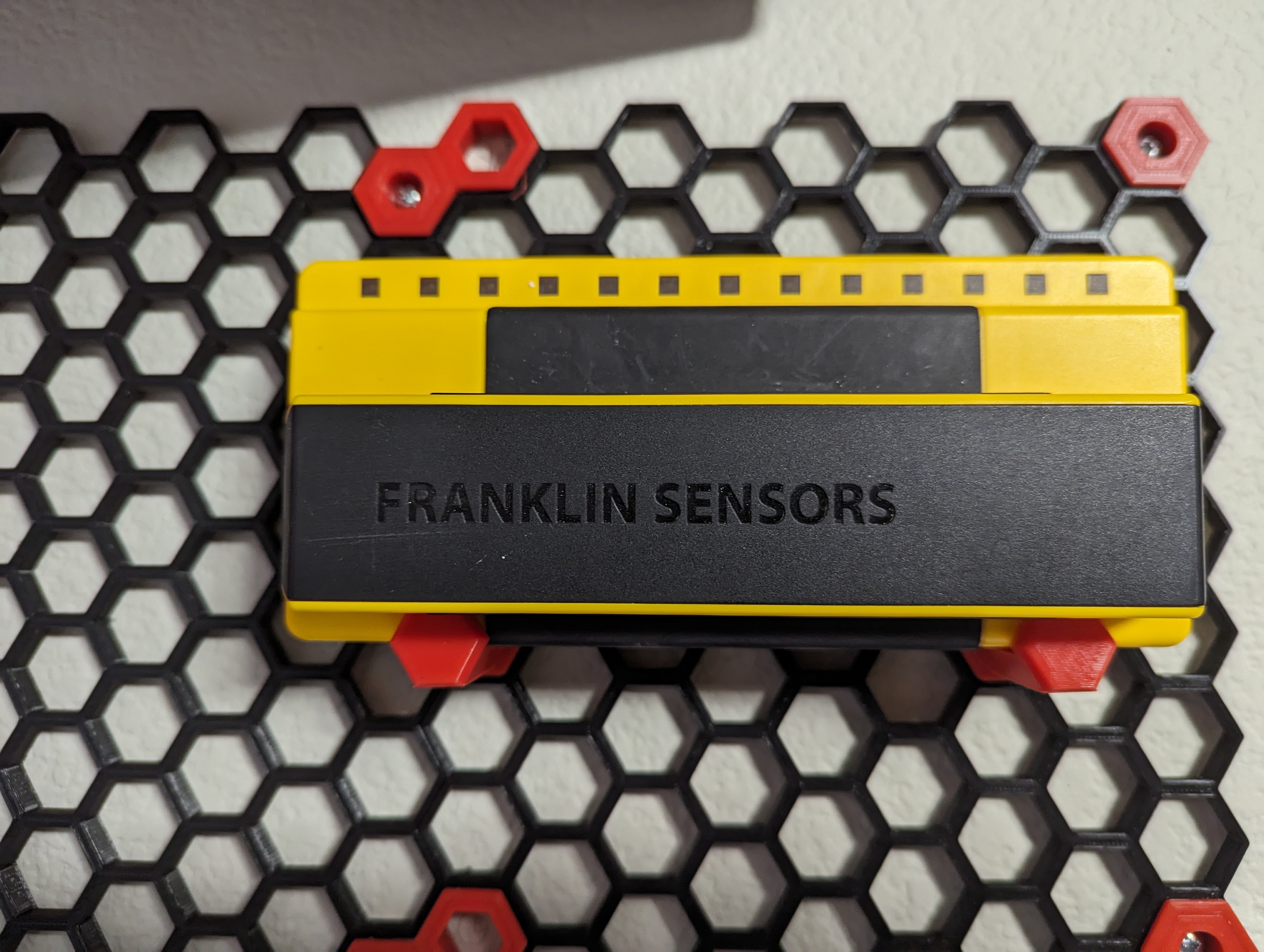 Simple holder for the Franklin Sensor Stud Finder.
