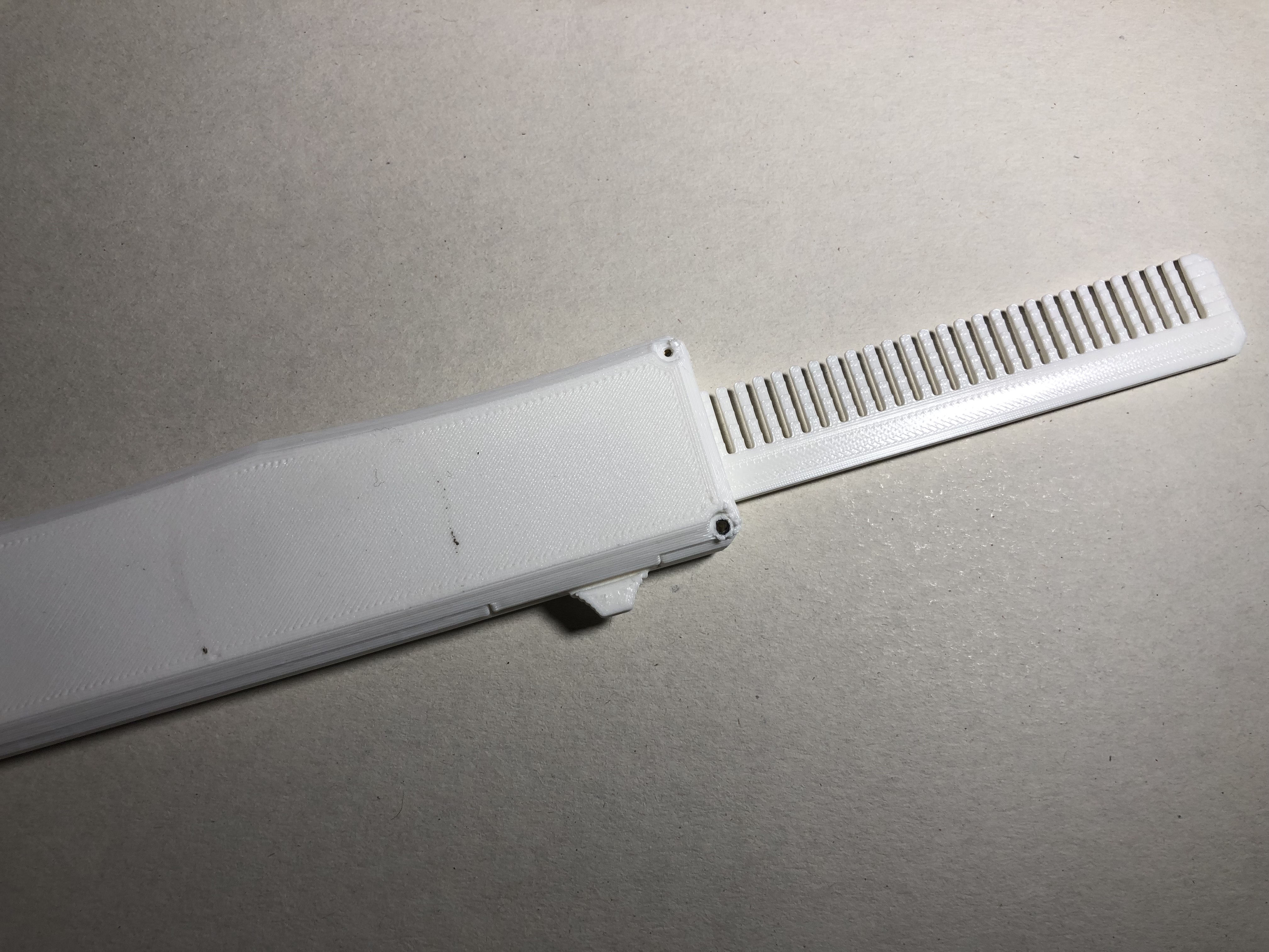OTF Switchblade Hairbrush