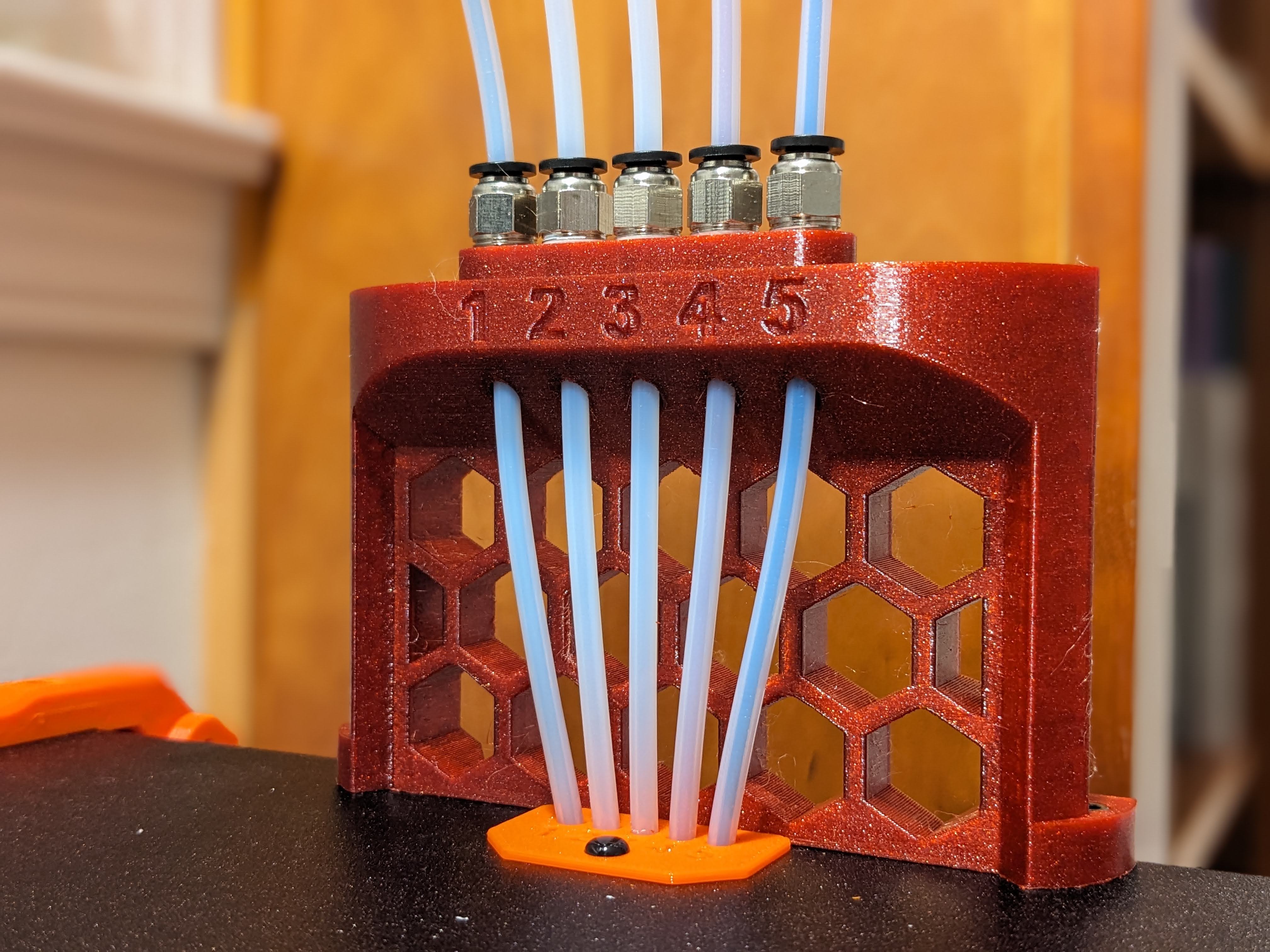 MMU2 tube feeder for the Prusa enclosure with honeycomb pattern