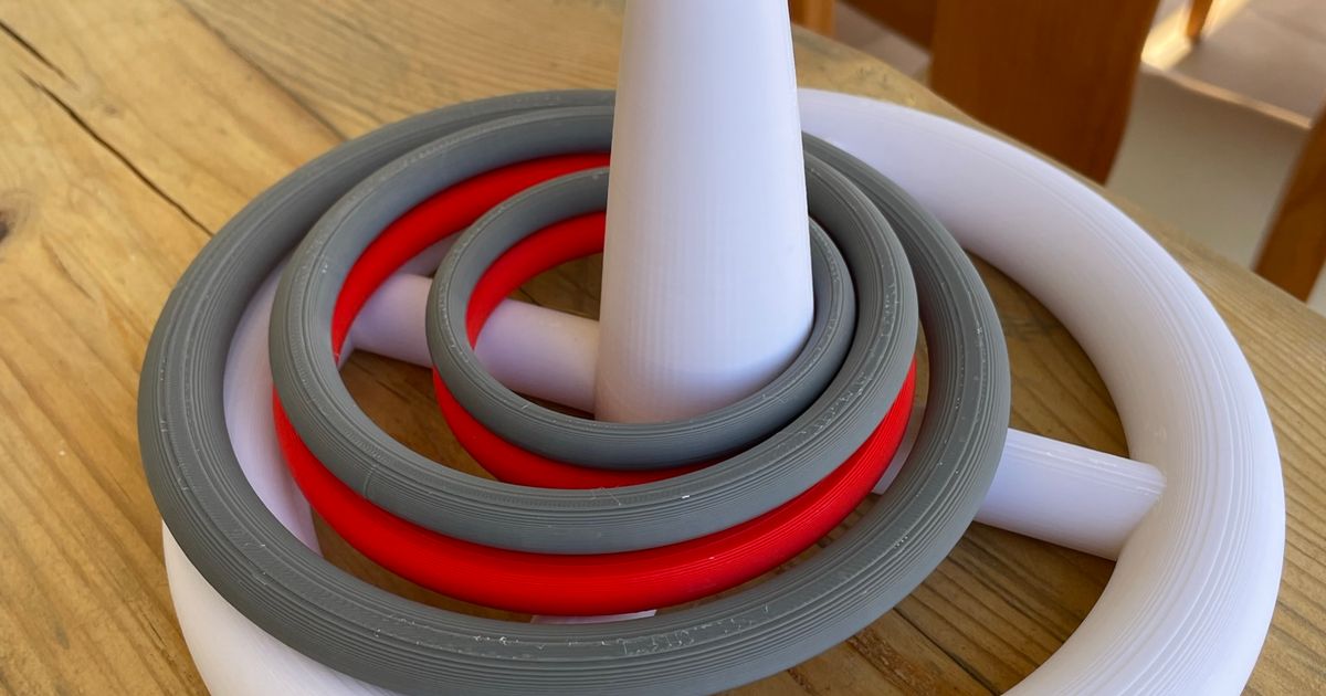 Swimming pool game floating cone and hoops by Fernando Peñas Antunez