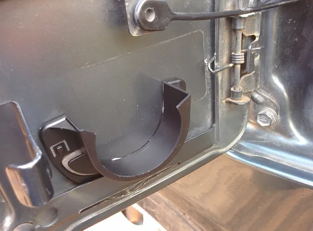 NISSAN gas cap holder