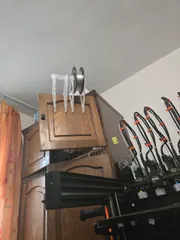 Cabinet door spool hanger