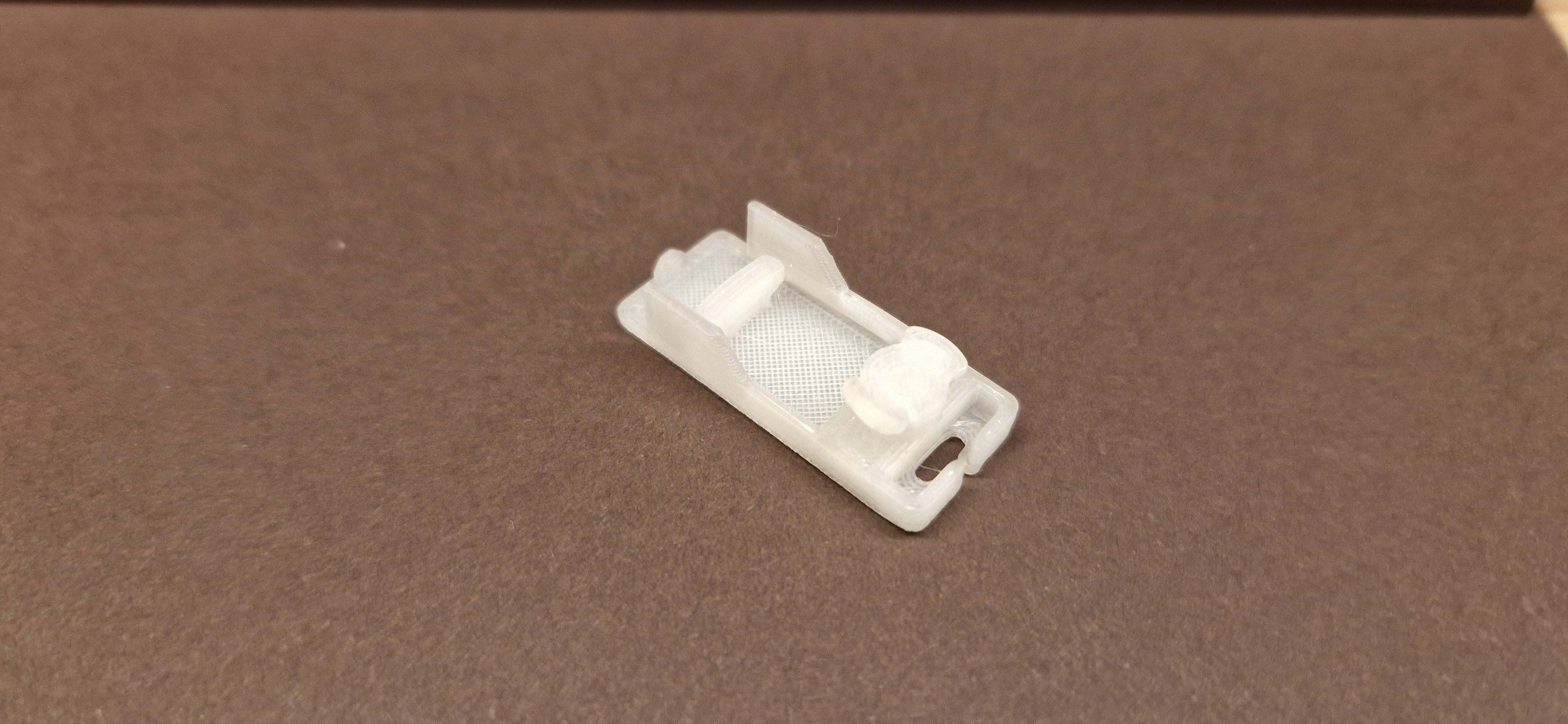 Upper part of mounting bracket for pleated blinds from Jysk.