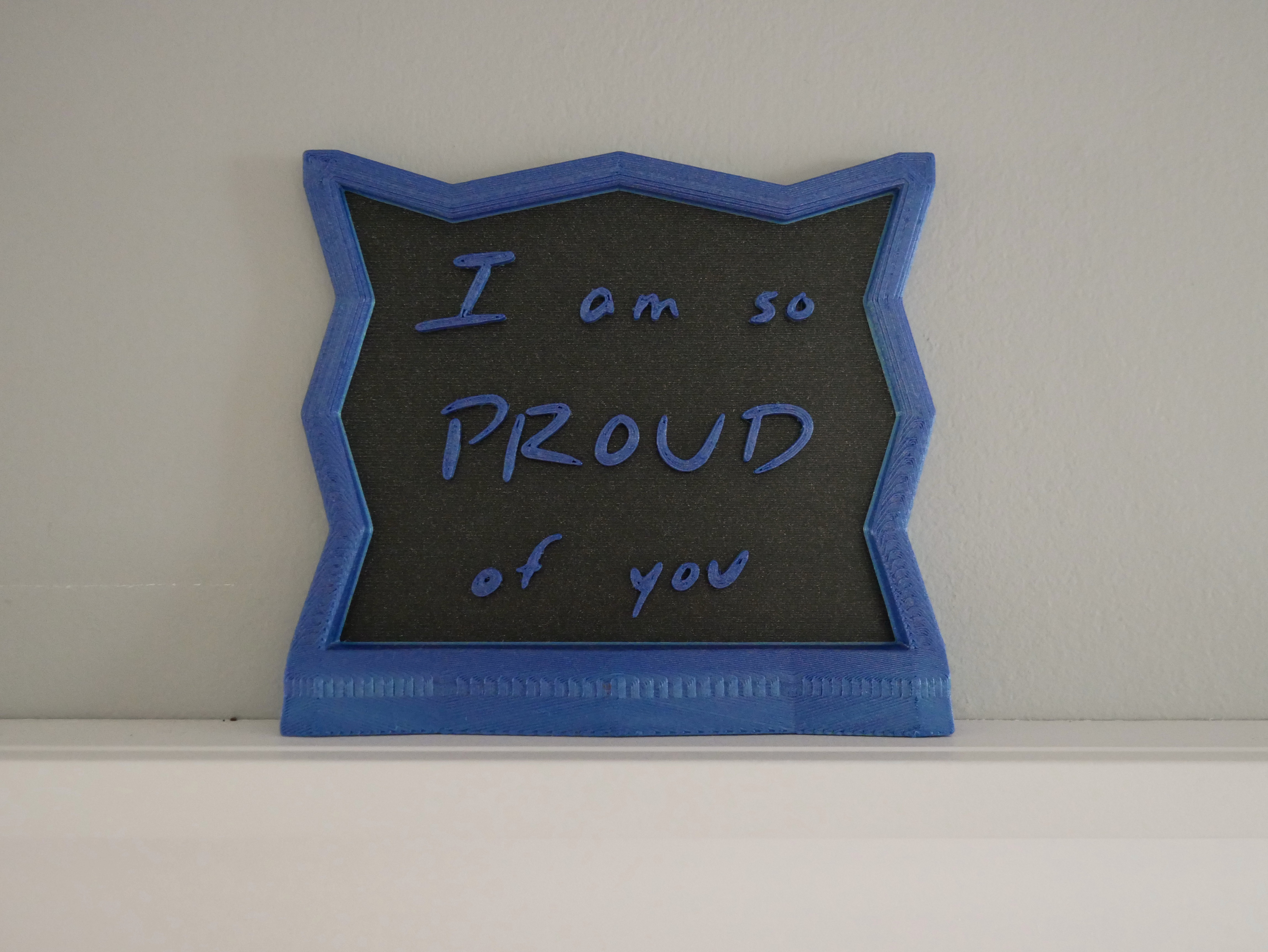 "I am so proud of you" sign