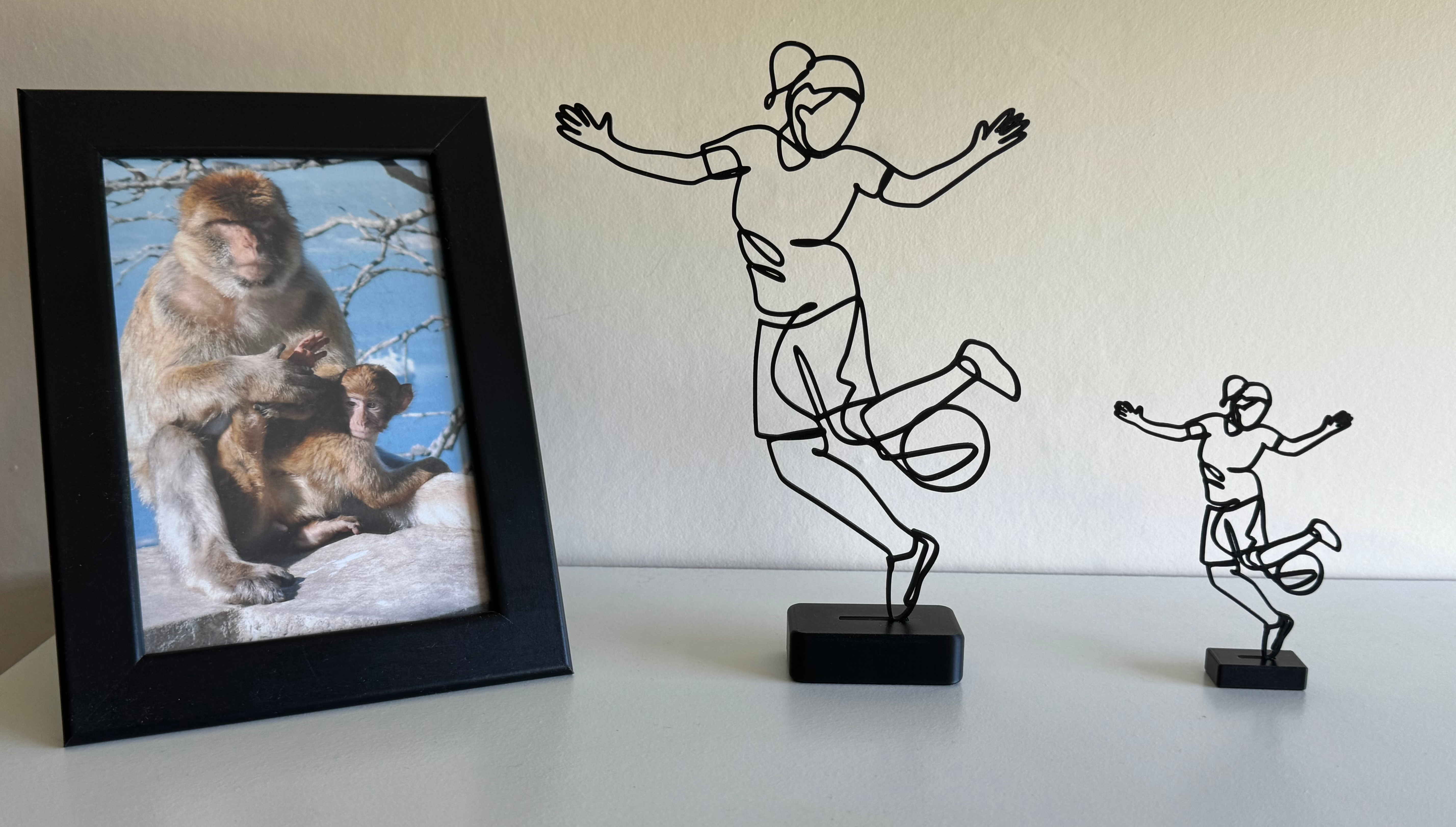 Female Footballer Line Art Sculpture