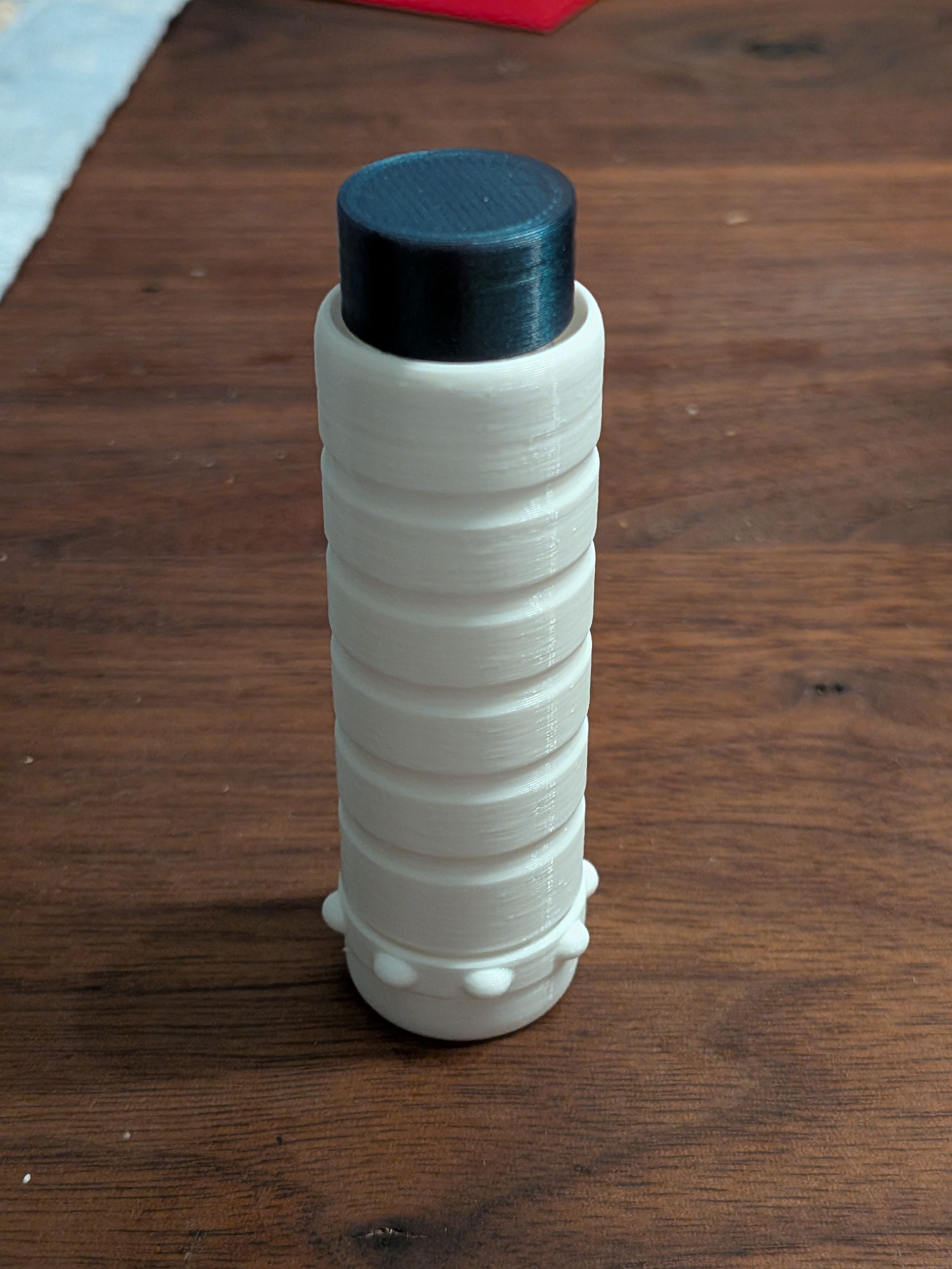 Fidget clicker with spinning ring