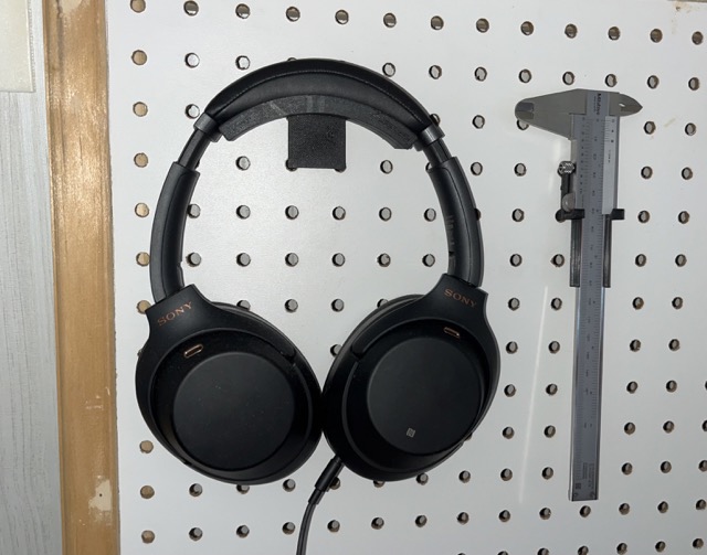 peg board mount collection for headphones and Mitutoyo calipers