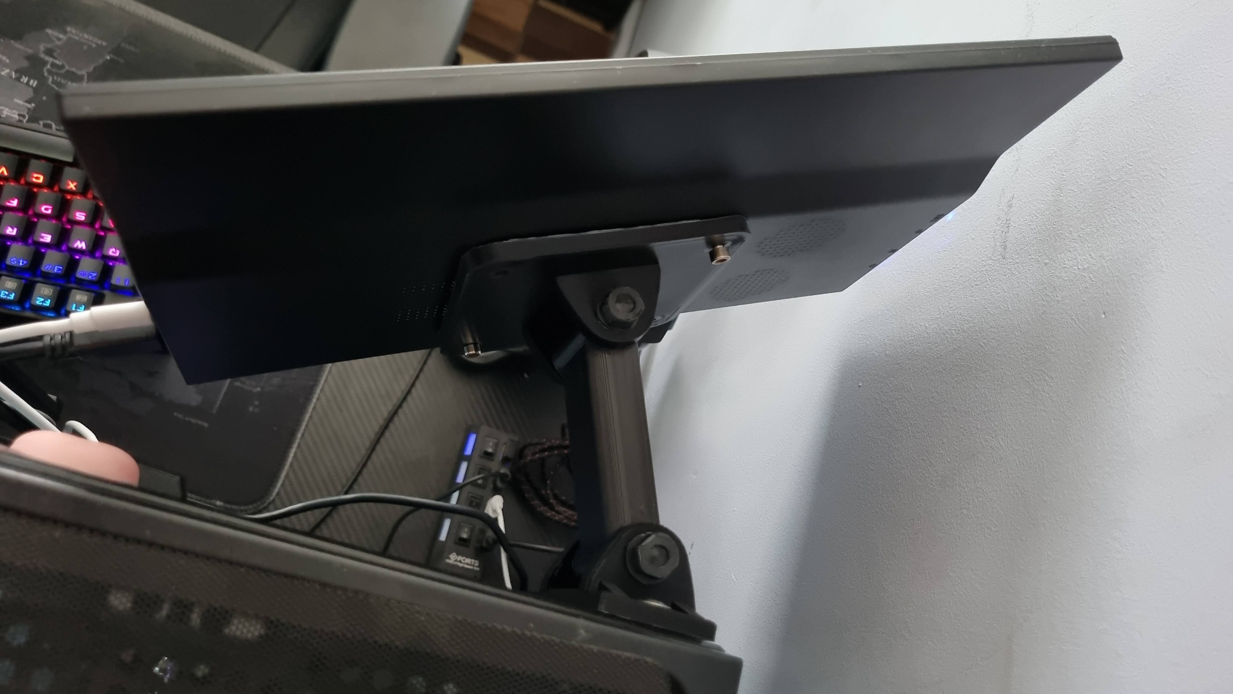 Hinged support for 75mm VESA monitor