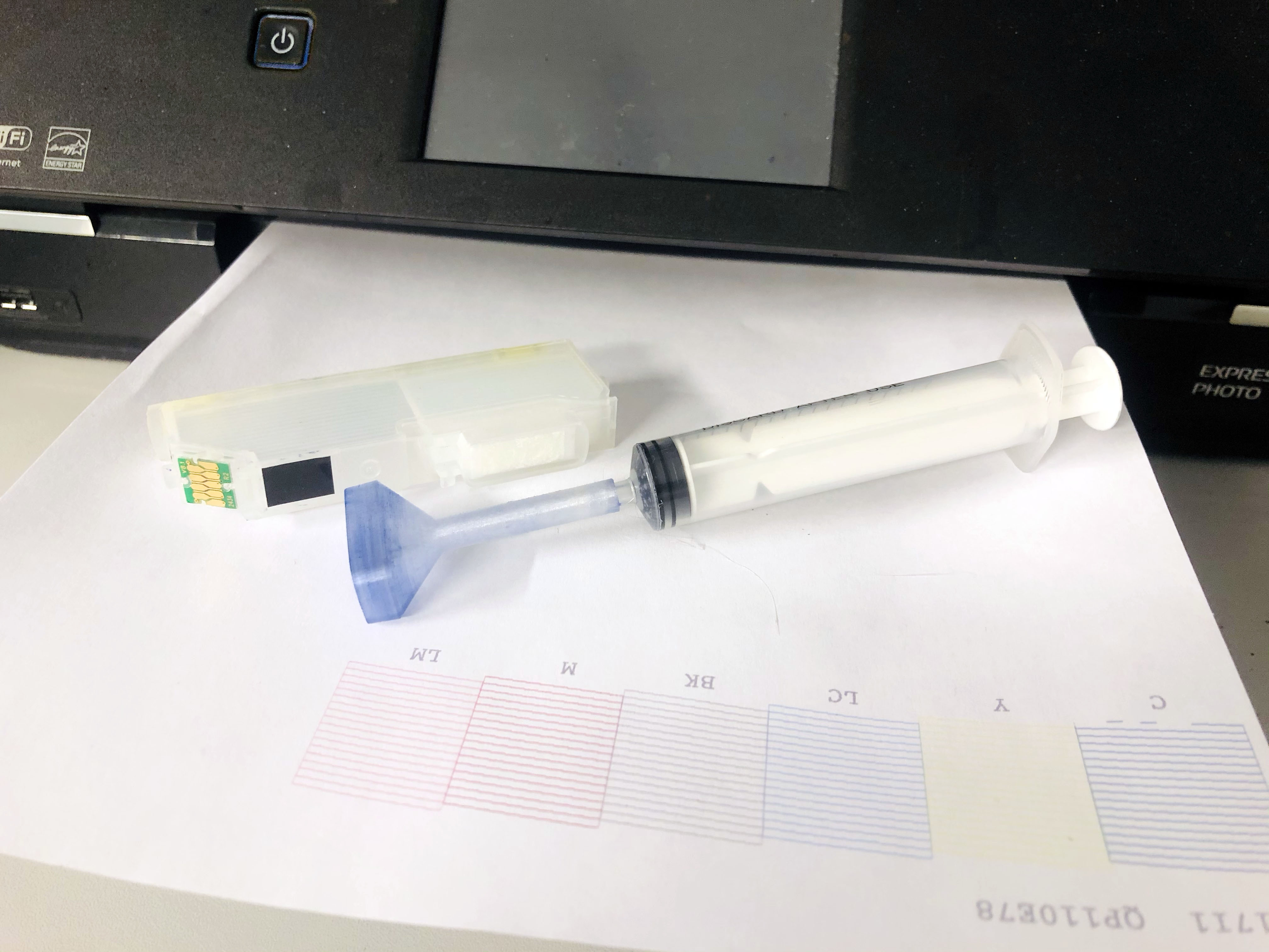 Syringe adapter for epson clogged print head