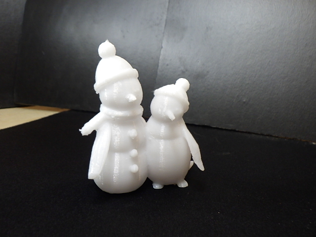Florida Snowman and Mrs Penguin