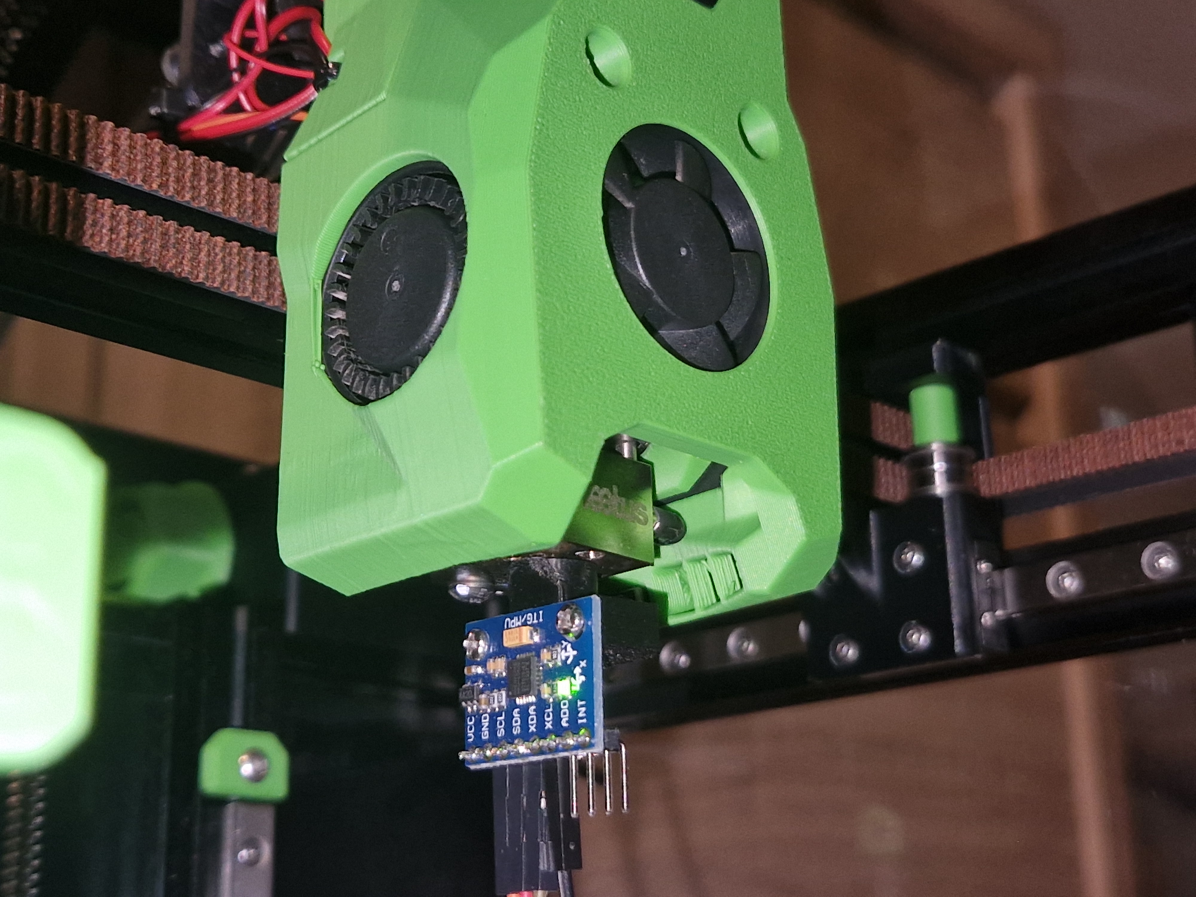 Nozzle mounted input shaper