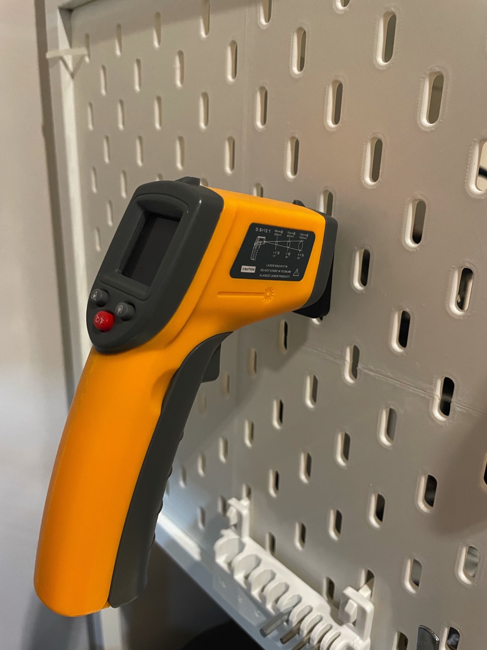 Infrared thermometer holder for Skadis
