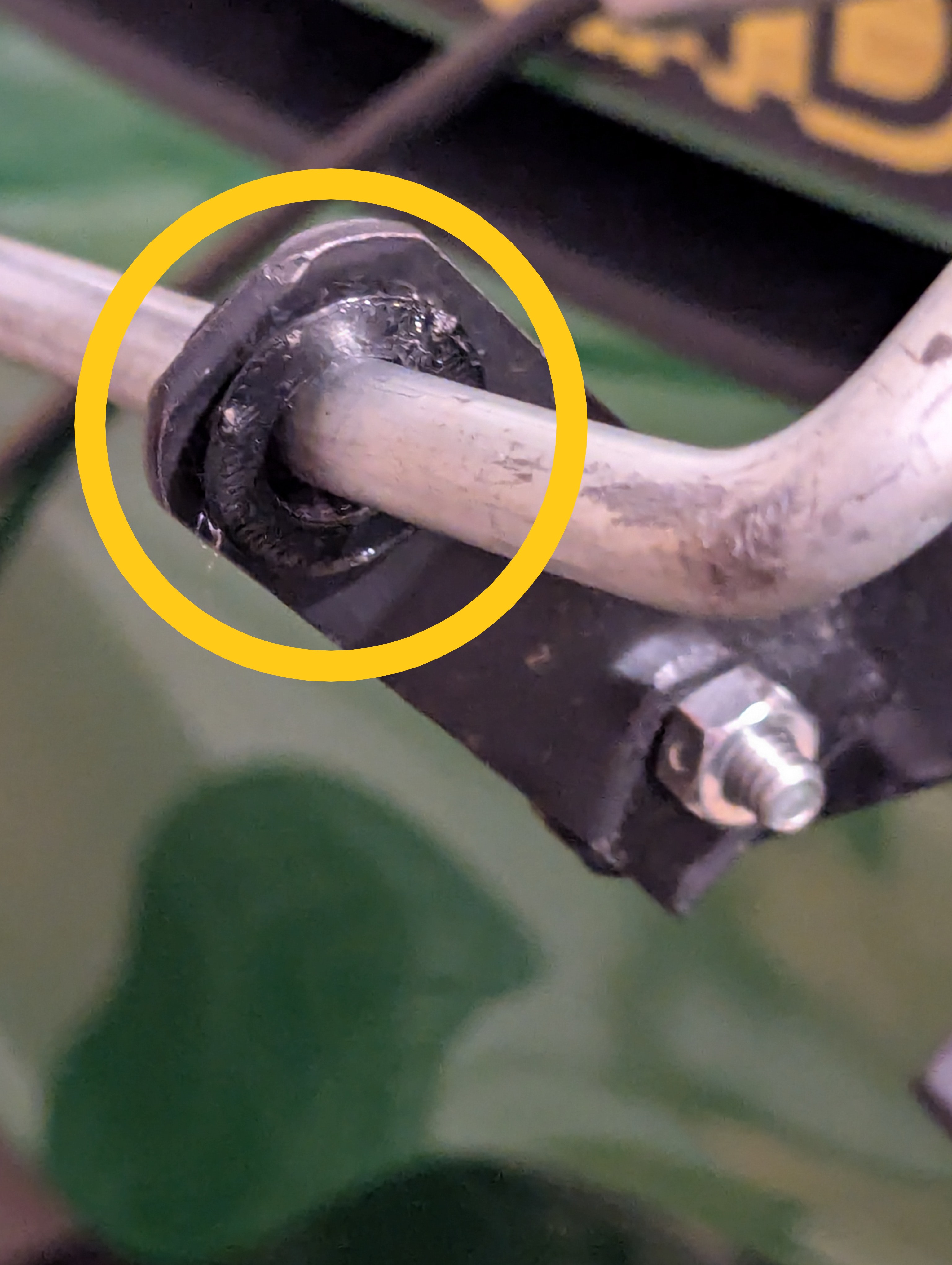 Flanged split bushing for snowblower