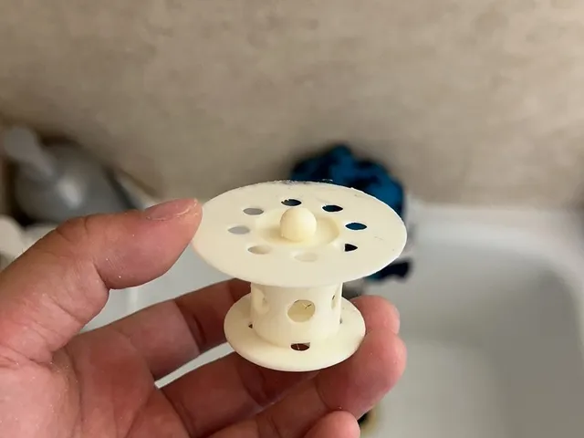 Hair strainer for bath tub