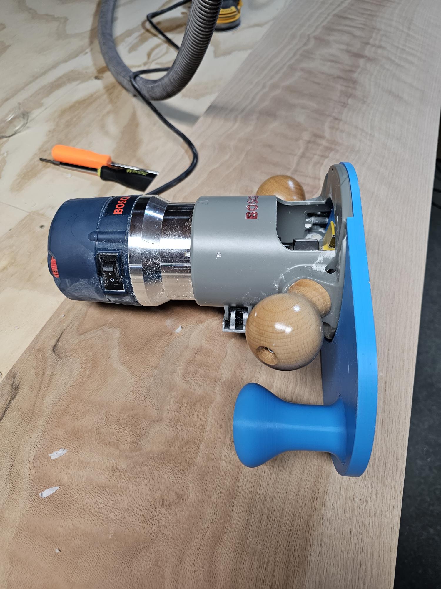 Extended Bosch 1617 Fixed Base Plate for larger bits by Aaron Wood