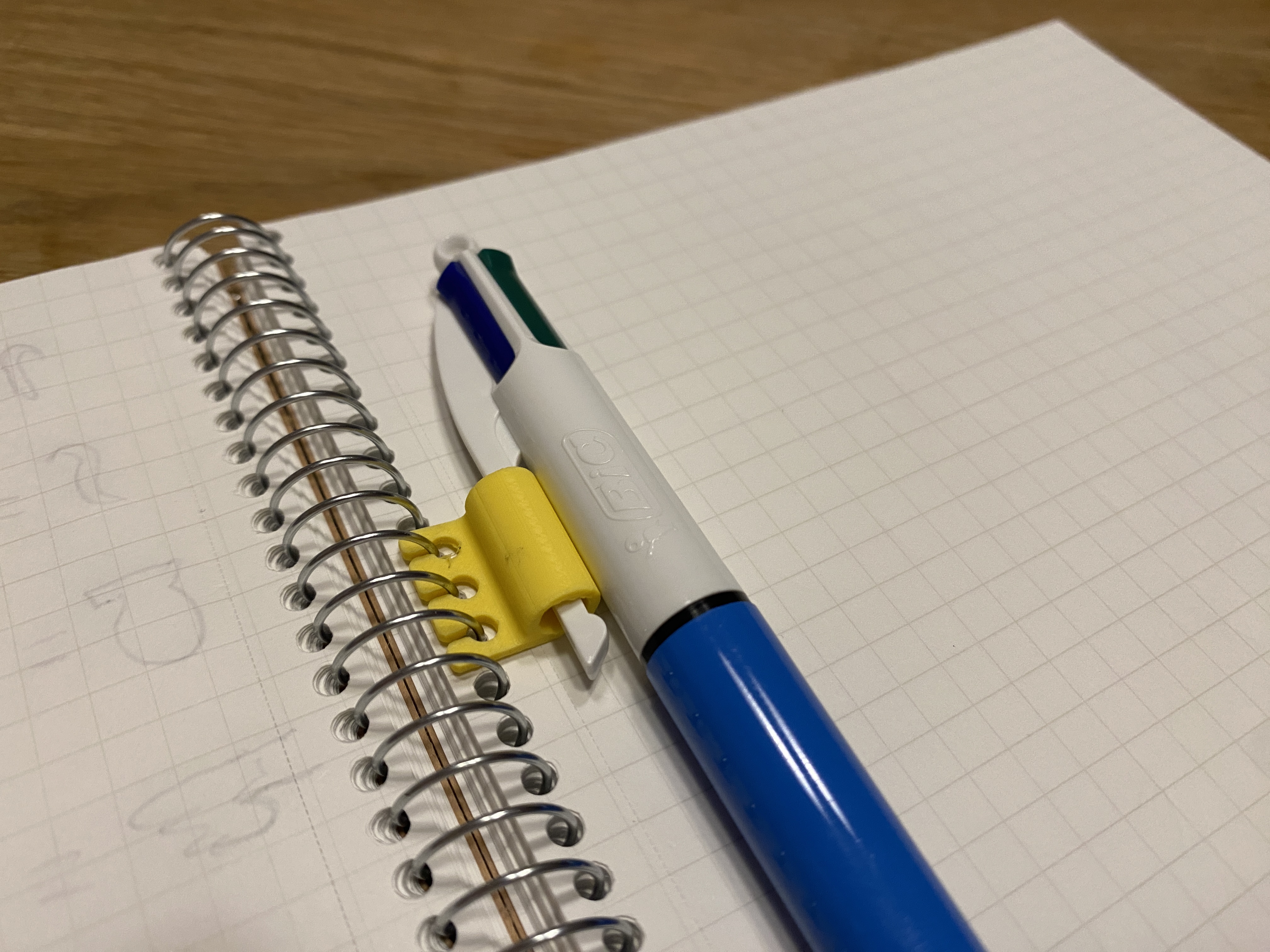 Spiral pen clip
