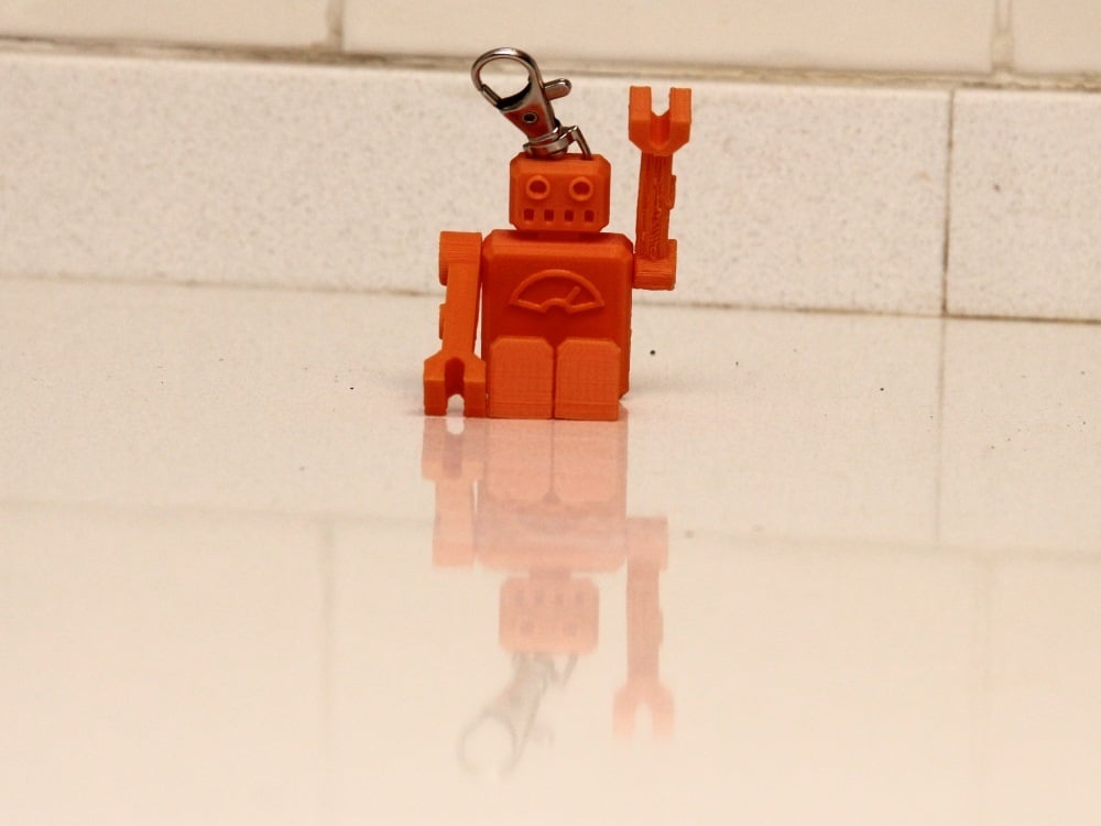 One piece articulated robot keychain with a clip by Nir Dobovizki