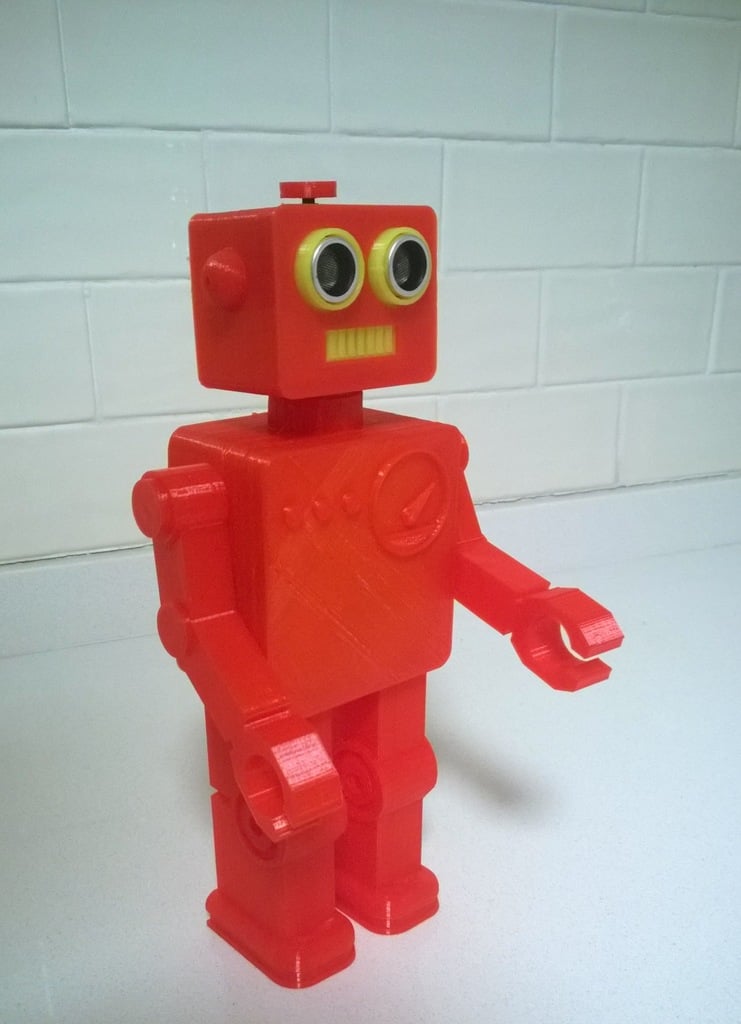 Robot with ultrasonic distance measuring sensor and microcontroller