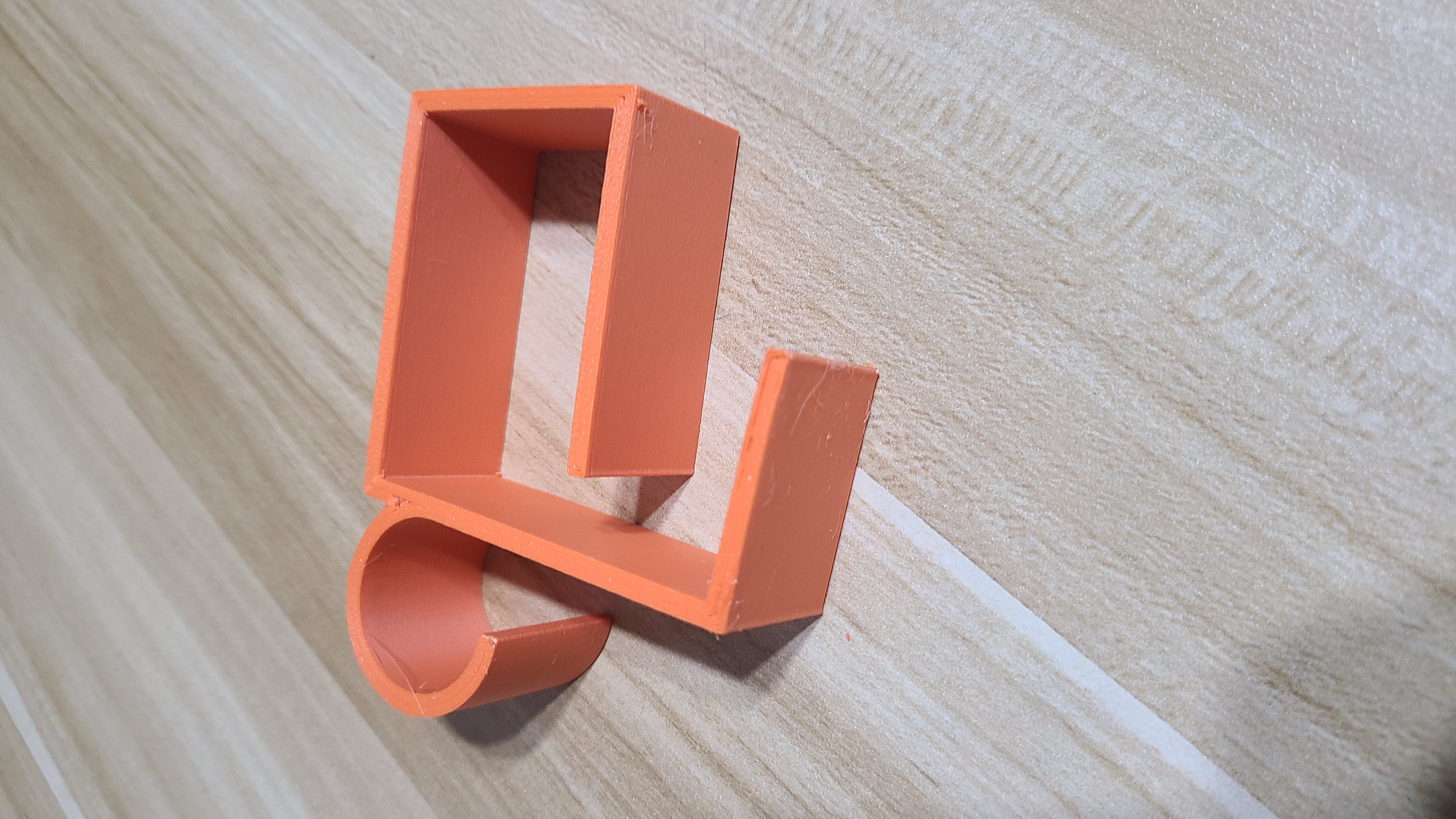 Behind-the-monitor Power Adapter Holder