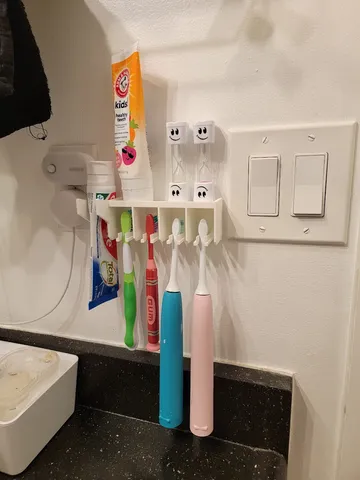 Wall mount bathroom toothbrush holder for 4 brushes, toothpaste and a shelf