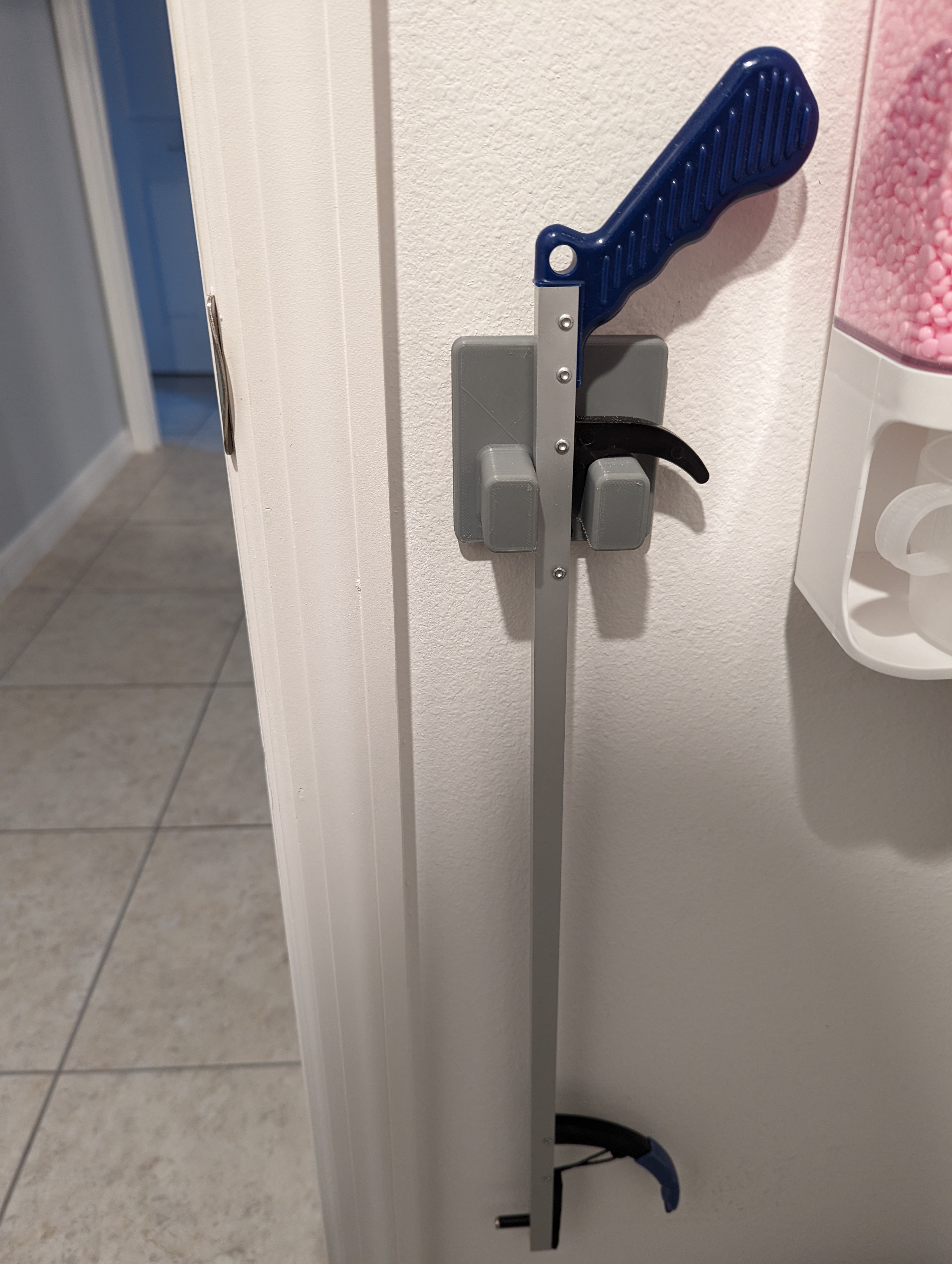 Wall mount holder for grabber/reacher