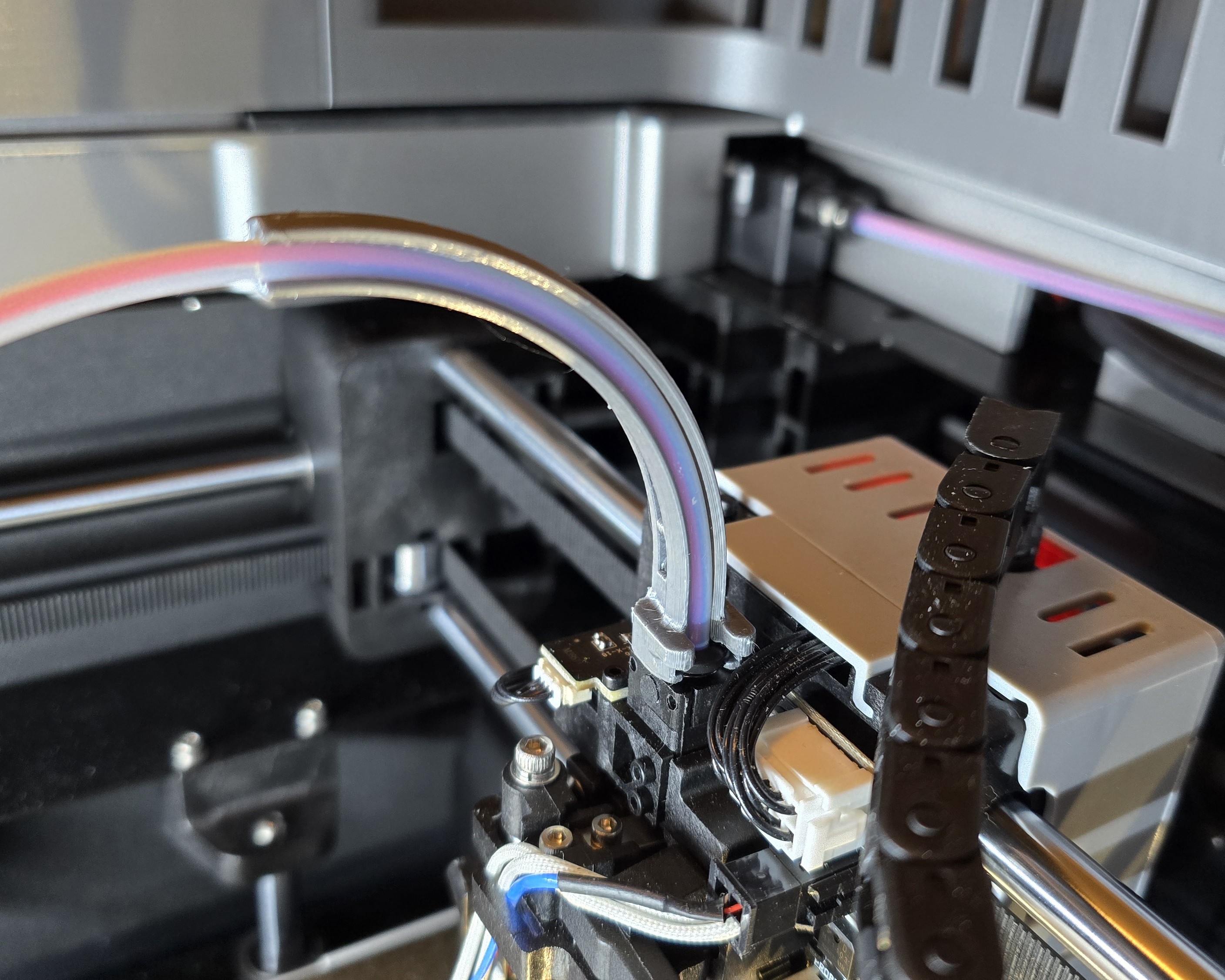 Extruder PTFE elbow tube guide