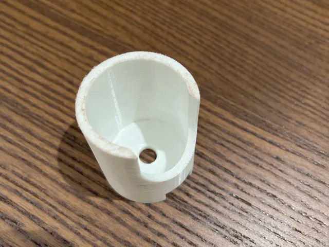 Wall mount for a bathroom spray hose
