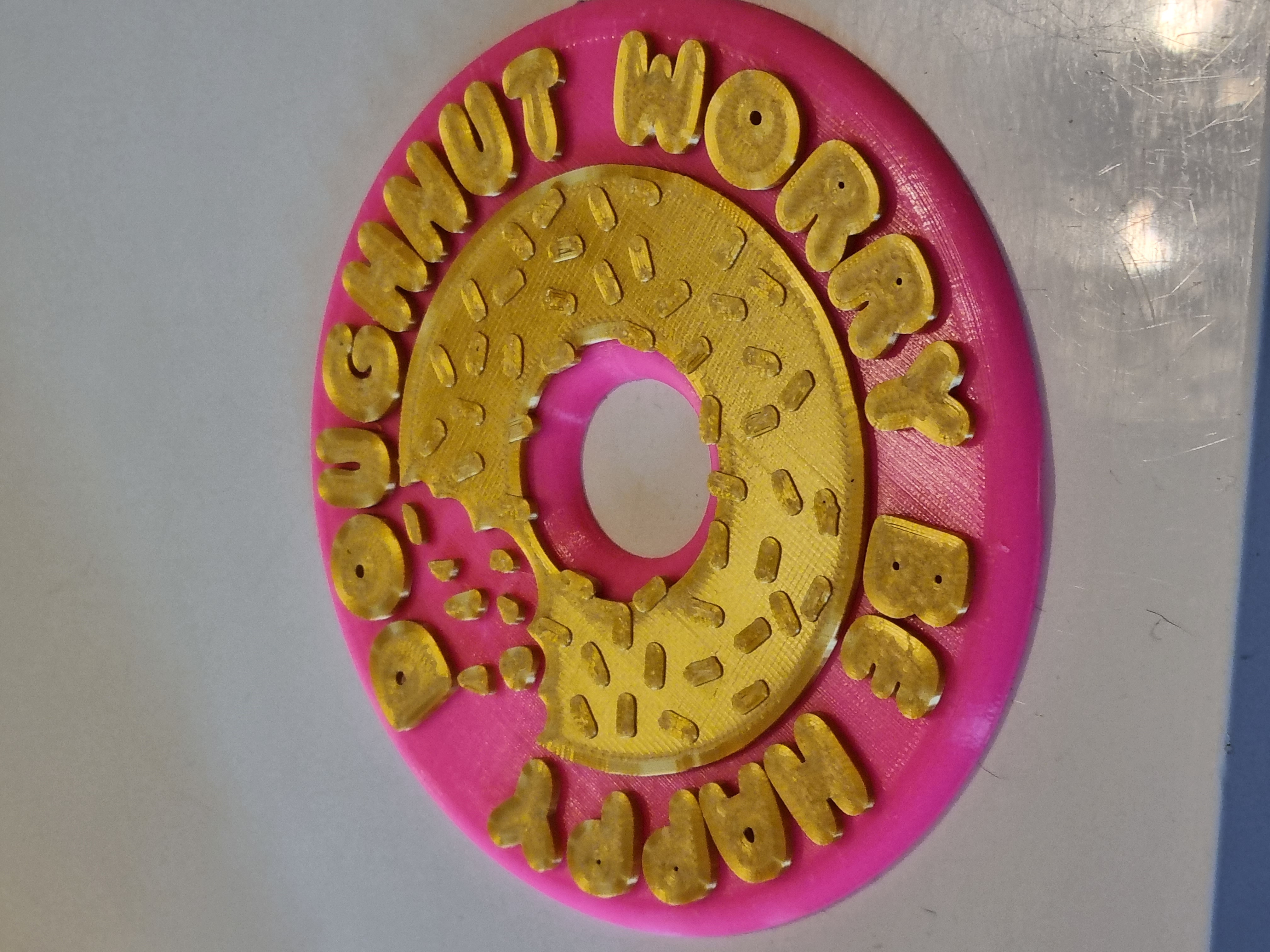 Coaster for a mug or beer, dougnut be worry be happy, two-color