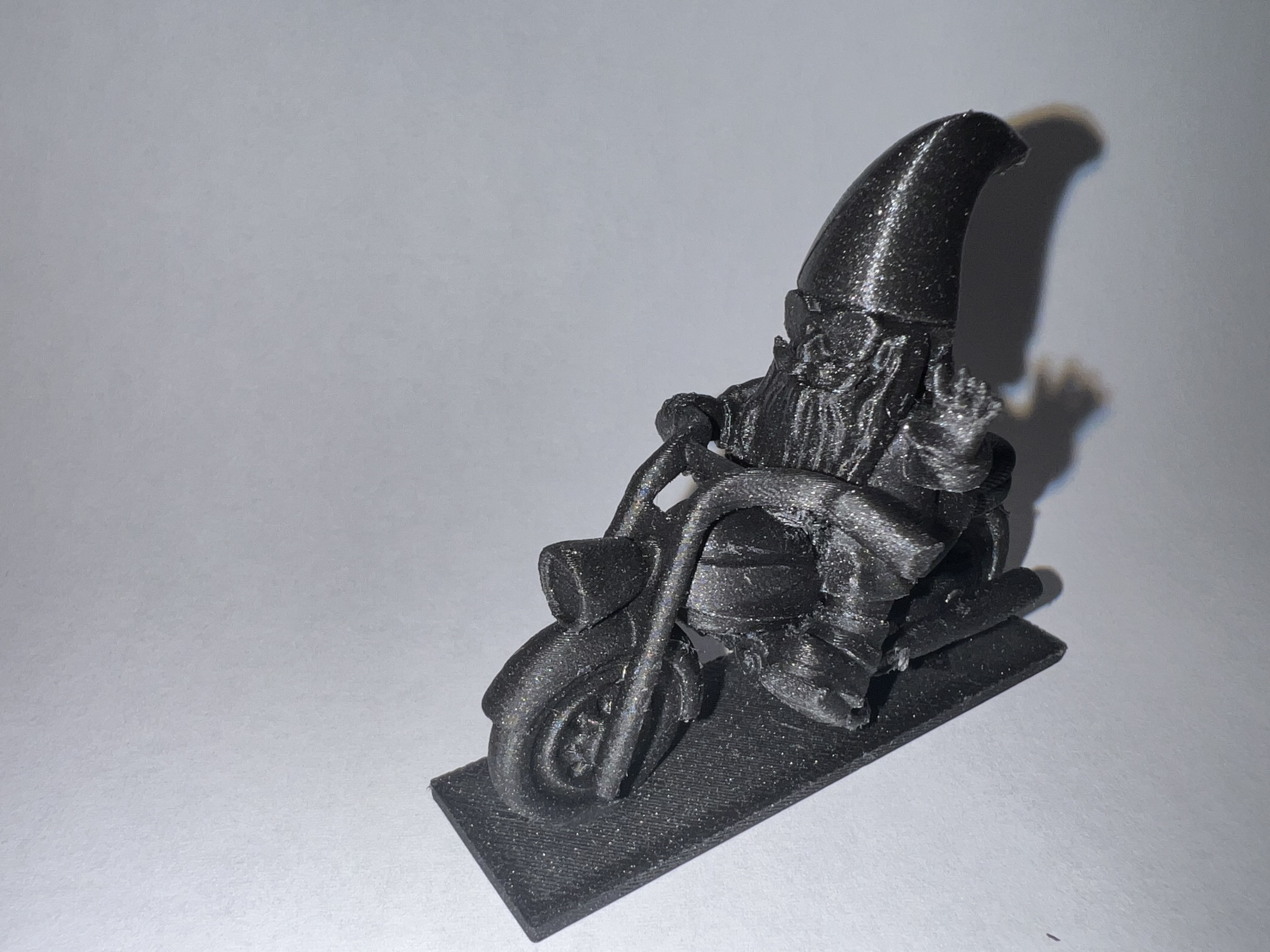 Garden Gnome on a Bike Repaired and Reinforced