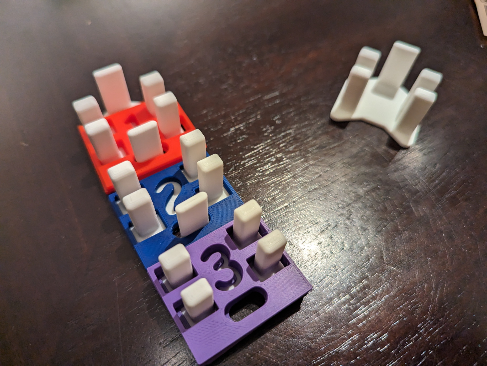 Holders for Monopoly Player Numbers
