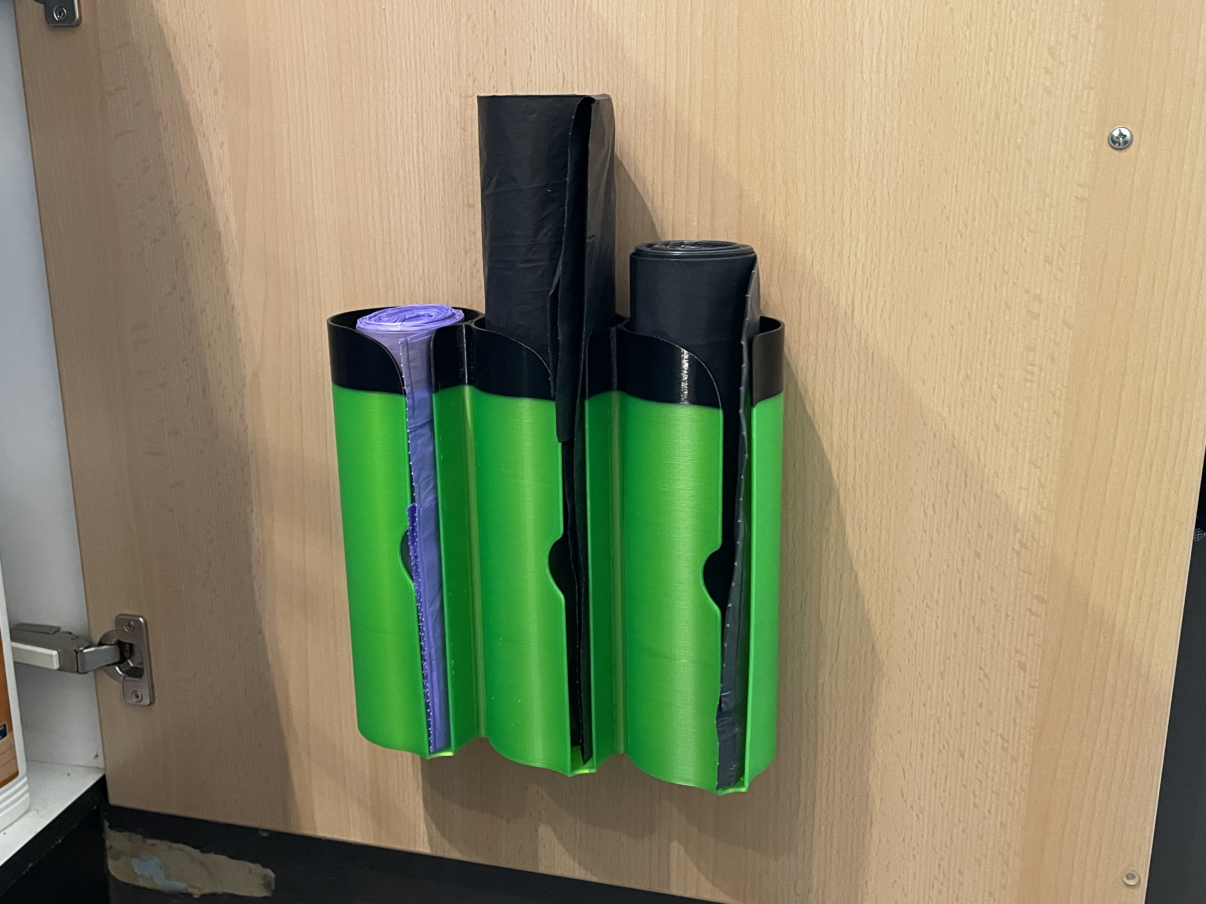 Parametric garbage bag dispenser
