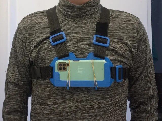 Chest mounted phone holder